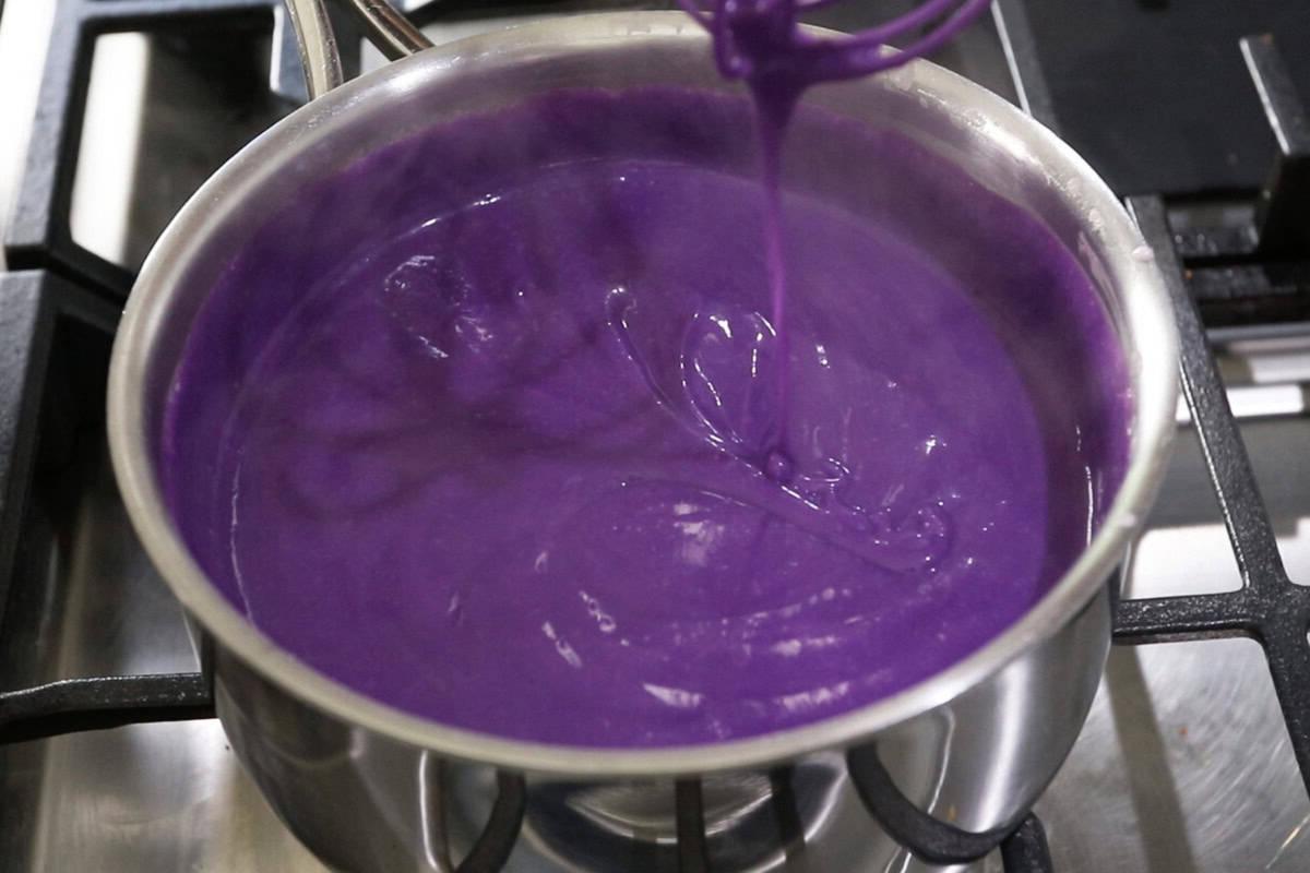 whisking the creme brulee batter in a pot