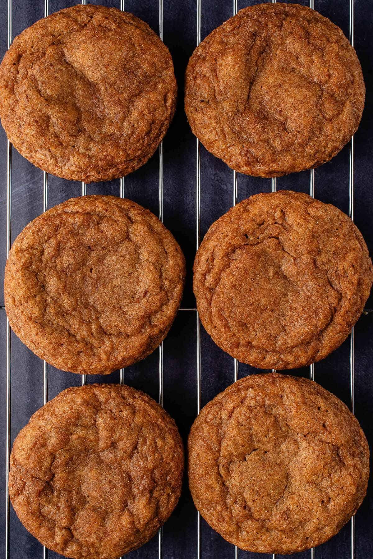vegan pumpkin sugar cookies on metal cooling rack