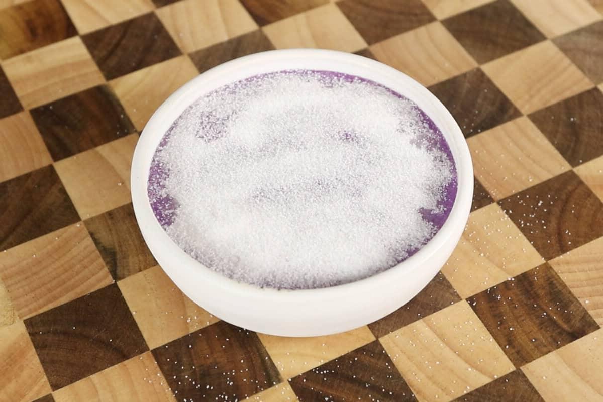 sugar sprinkled on the ube creme brulee