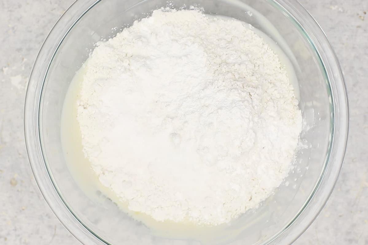 making gluten free flatbread in glass bowl