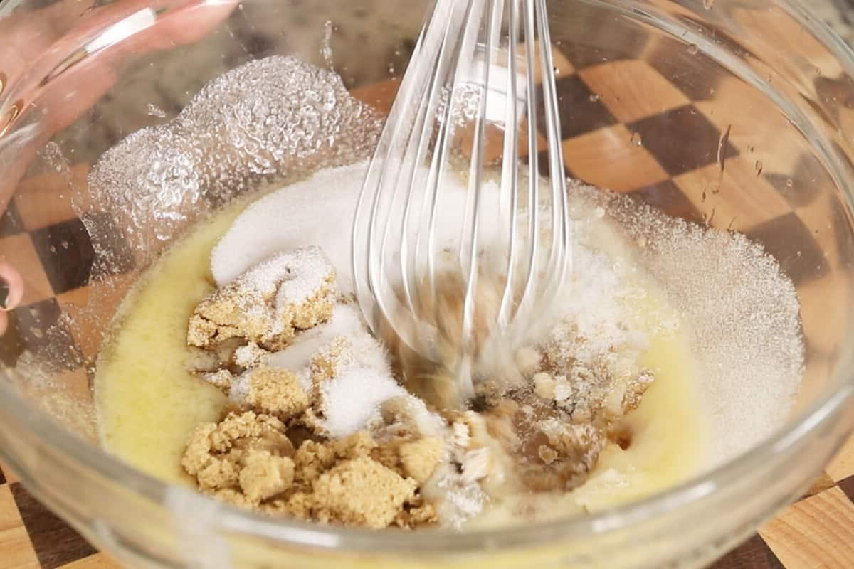 preparing vegan pumpkin sugar cookies in glass bowl