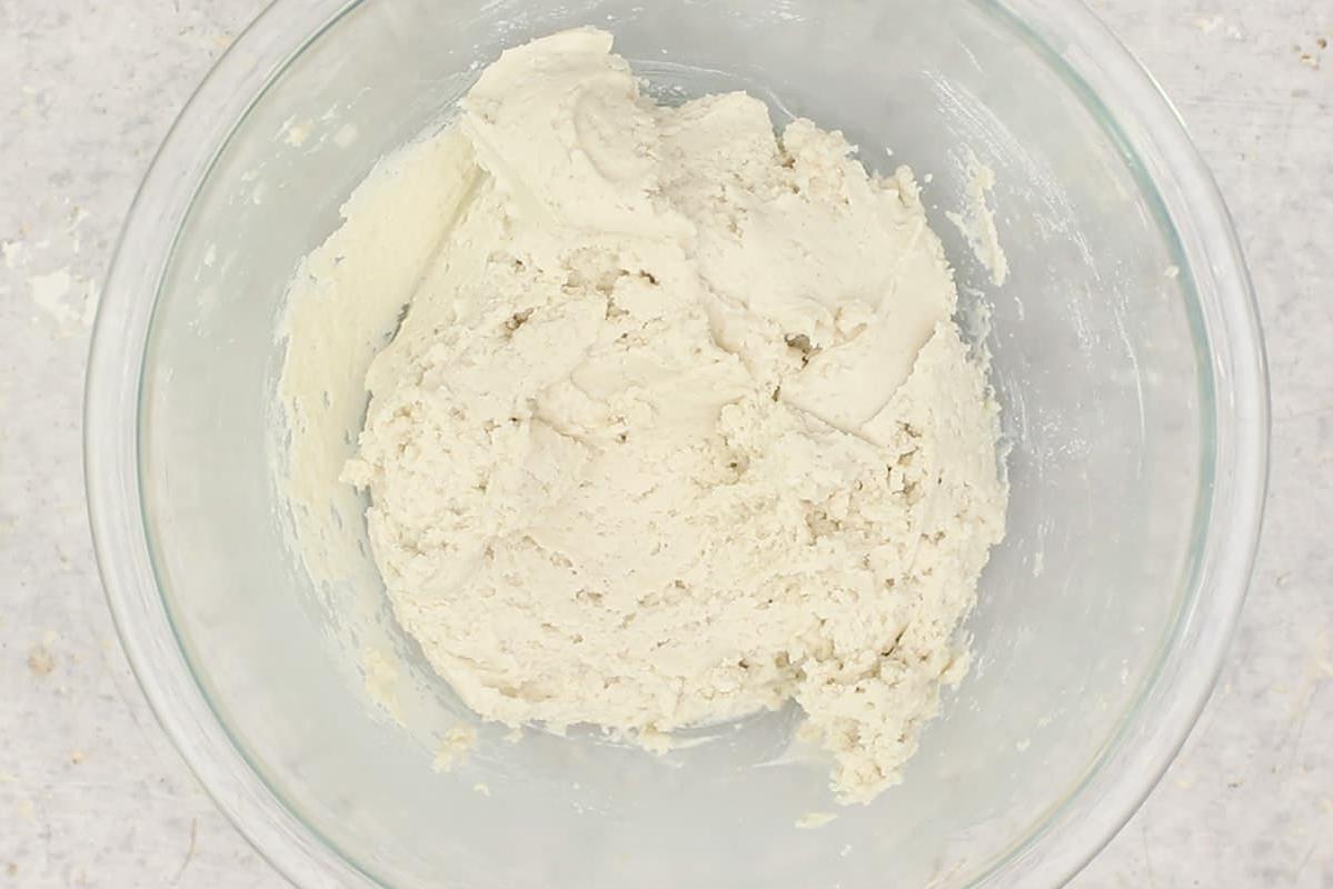 making gluten free flatbread in glass bowl