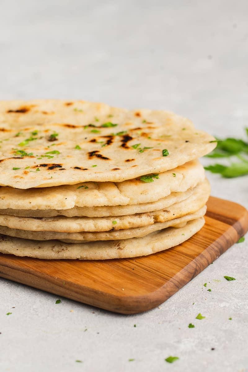 a close up shot of a stack of gluten free flatbread