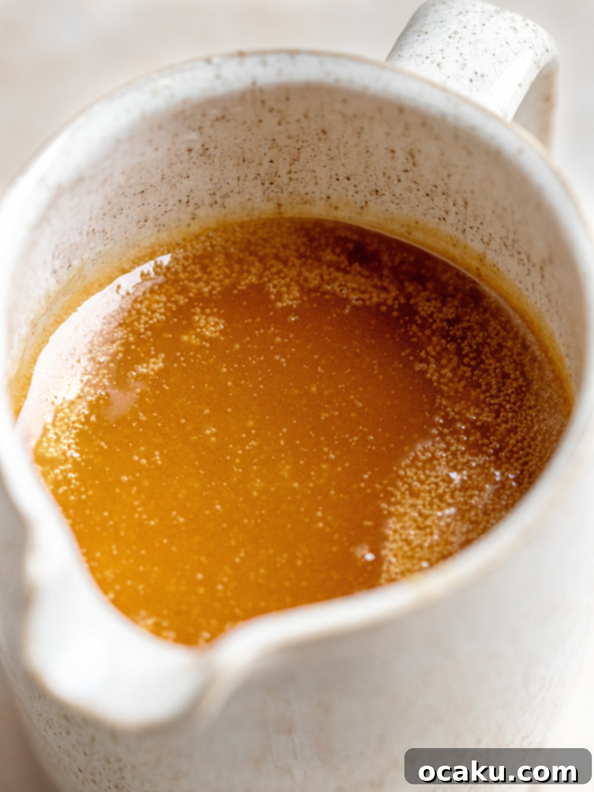 Adding eggs to the cake mixture