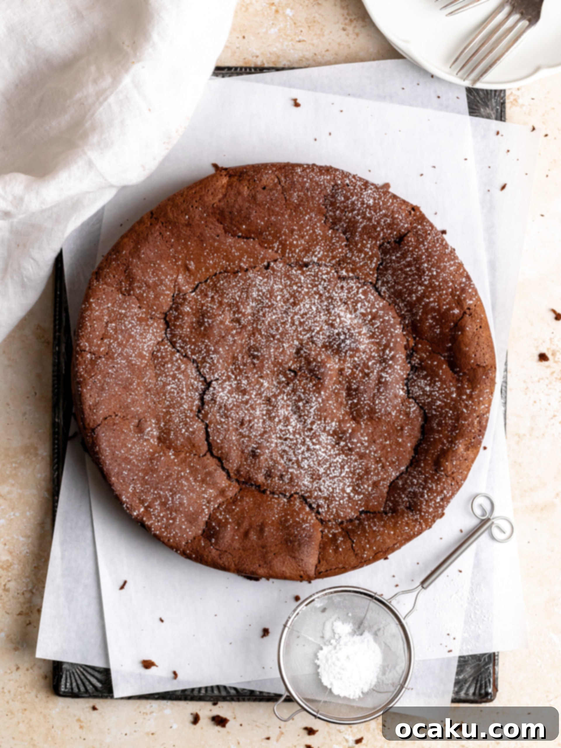 Flourless chocolate espresso cake baking in a springform pan.
