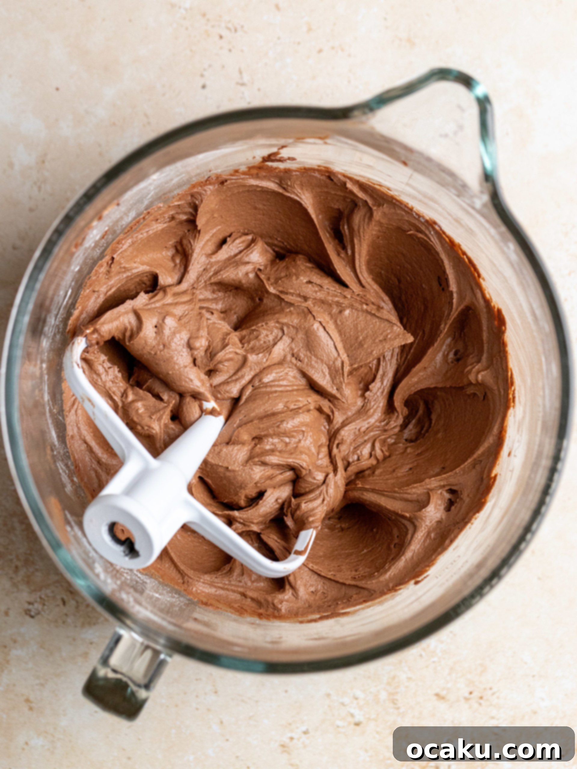 Finished chocolate orange cupcakes decorated with orange slices.