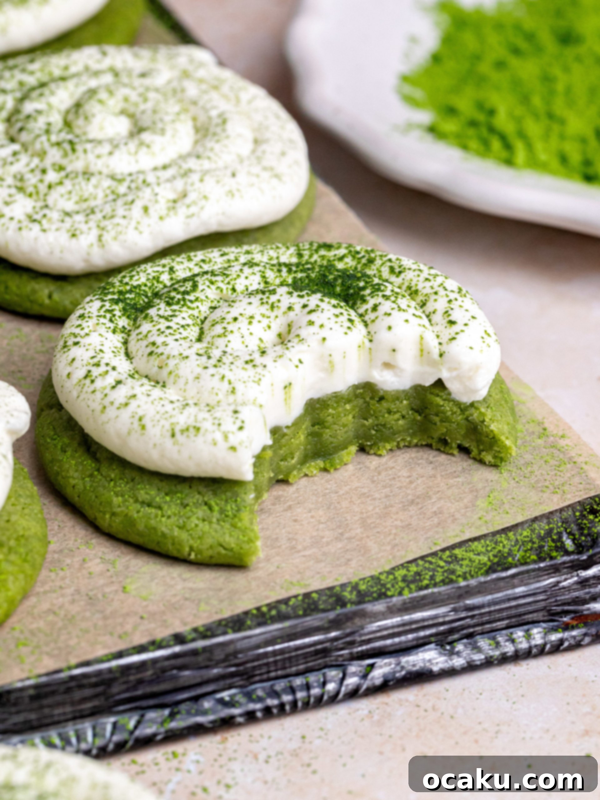 Aperol Spritz Cheesecake Close-up of a stack of Matcha Latte Cookies, showcasing their thick texture and creamy topping.