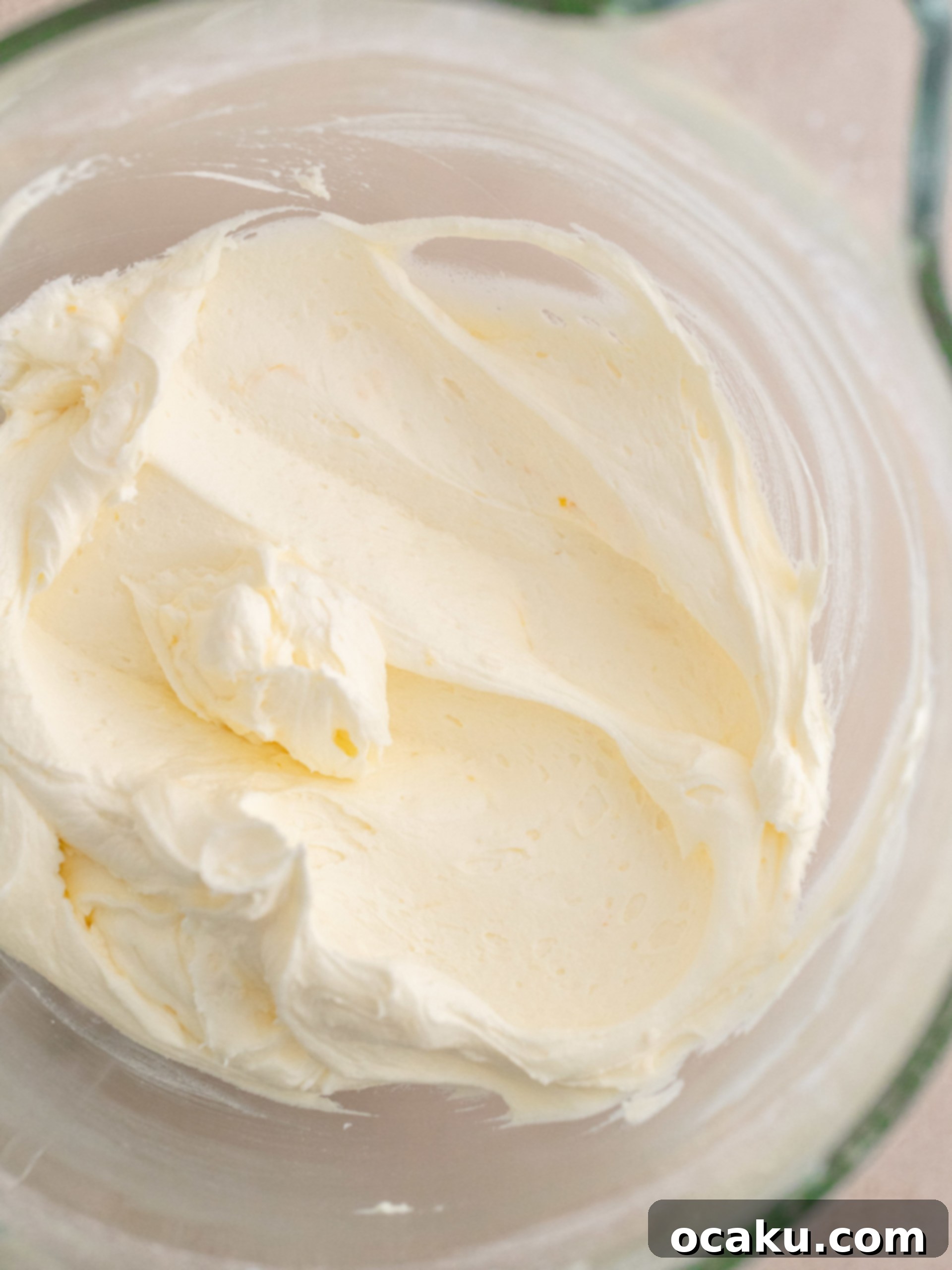 Vanilla cake layers being leveled.