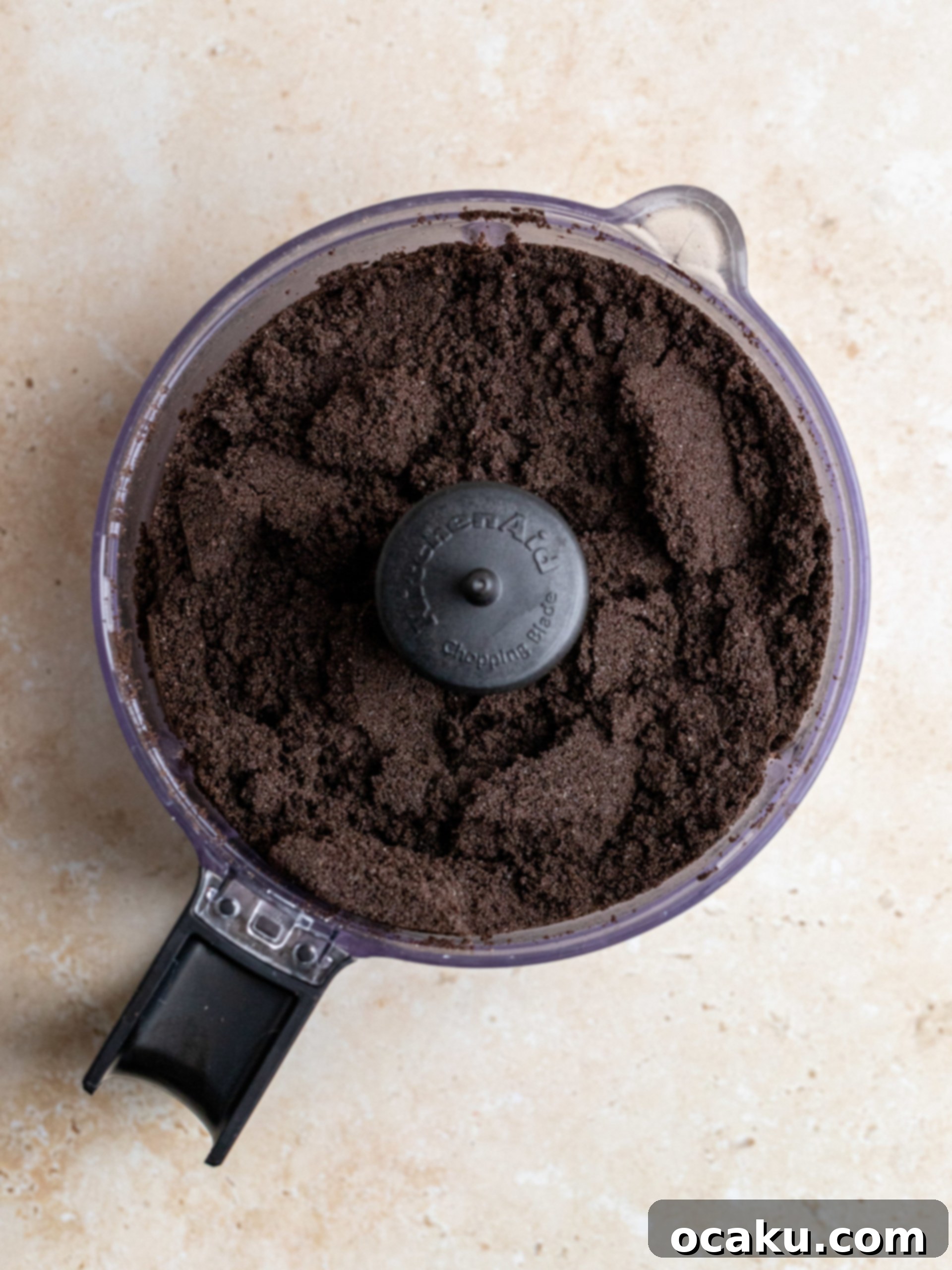 Easy No-Bake Oreo Cheesecake 3 Crushing Oreos for the cheesecake filling