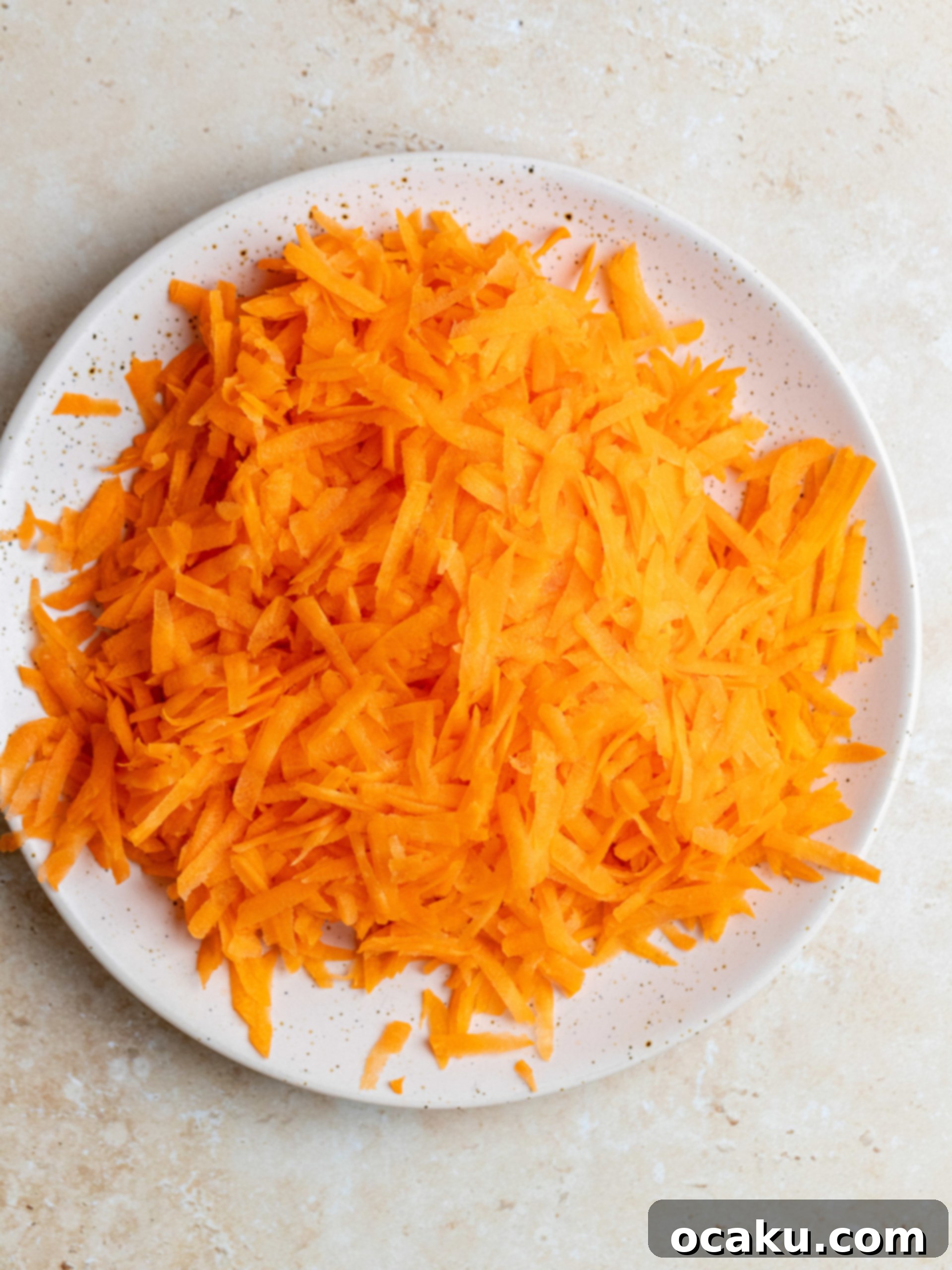 Spiced Carrot Loaf 3 Mixing wet ingredients in a bowl for the carrot cake loaf.