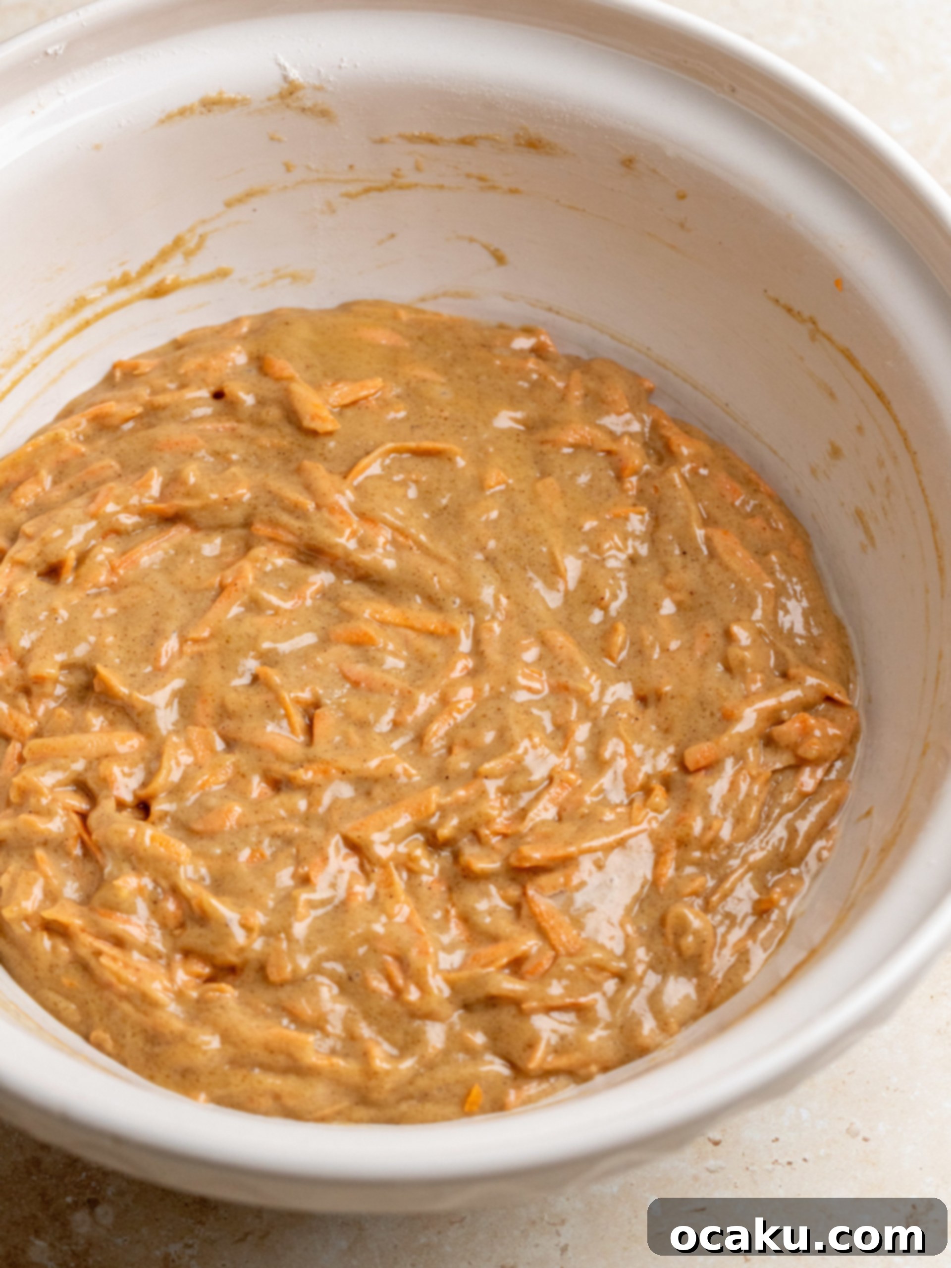 Spiced Carrot Loaf 4 Mixing dry ingredients in a separate bowl.