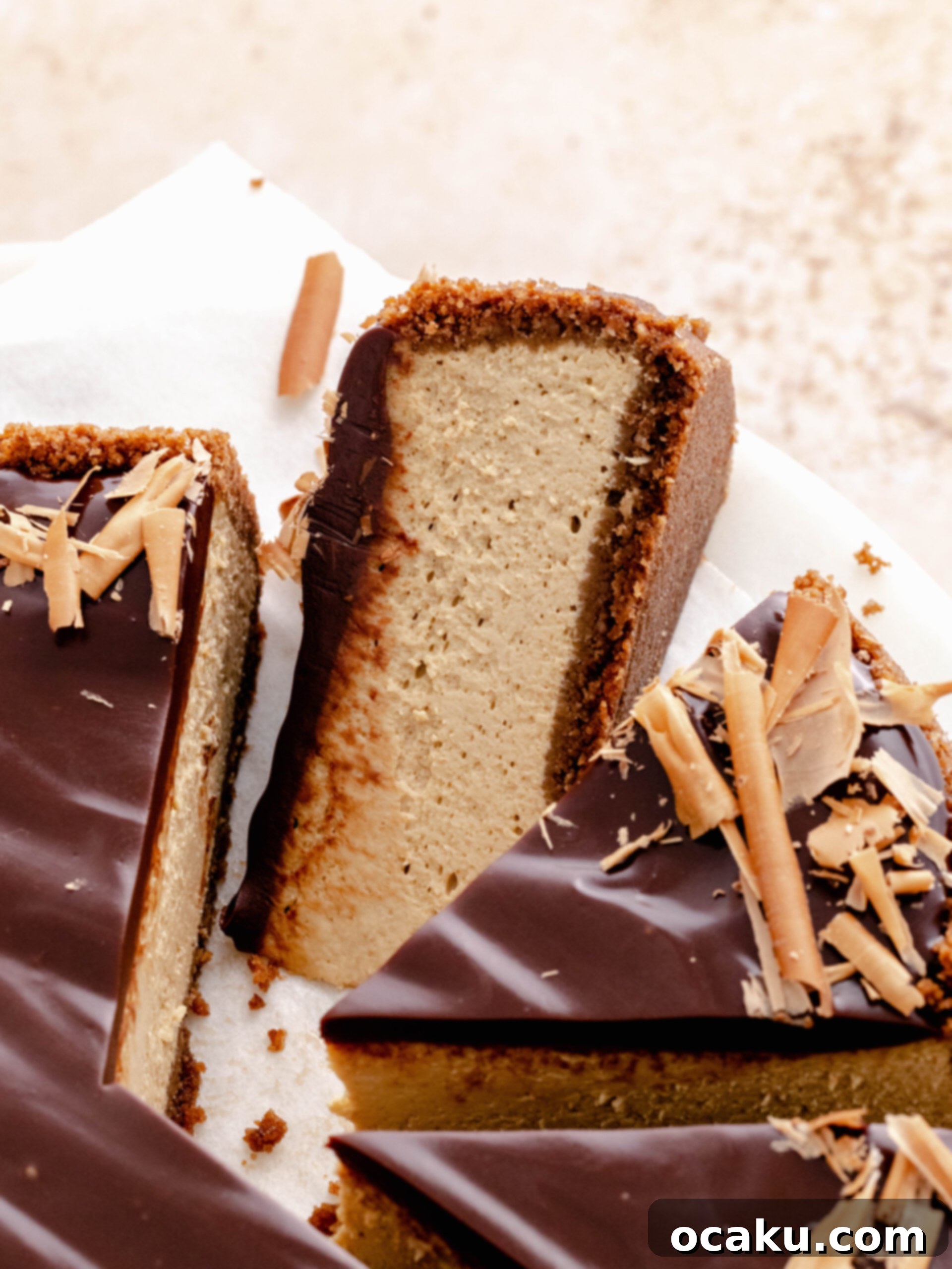 Espresso cheesecake cut into slices with on of the titled to side. 