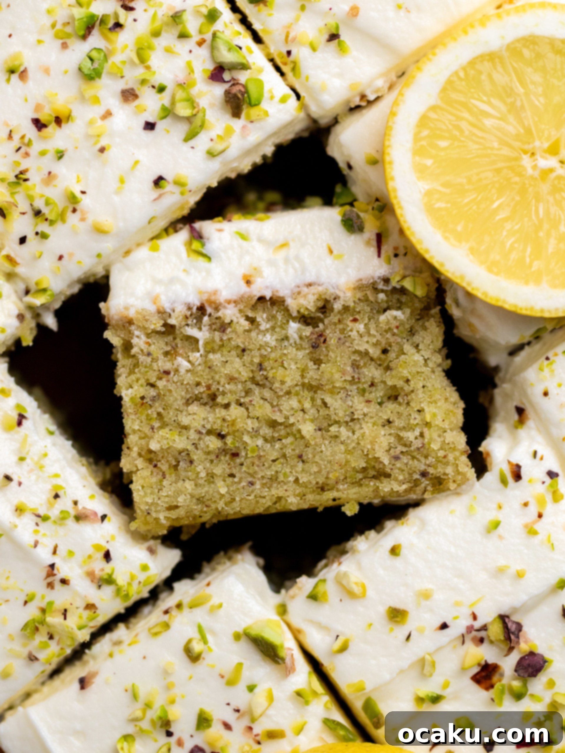 Elegant Lemon Pistachio Cake with a vibrant green pistachio sheet cake.