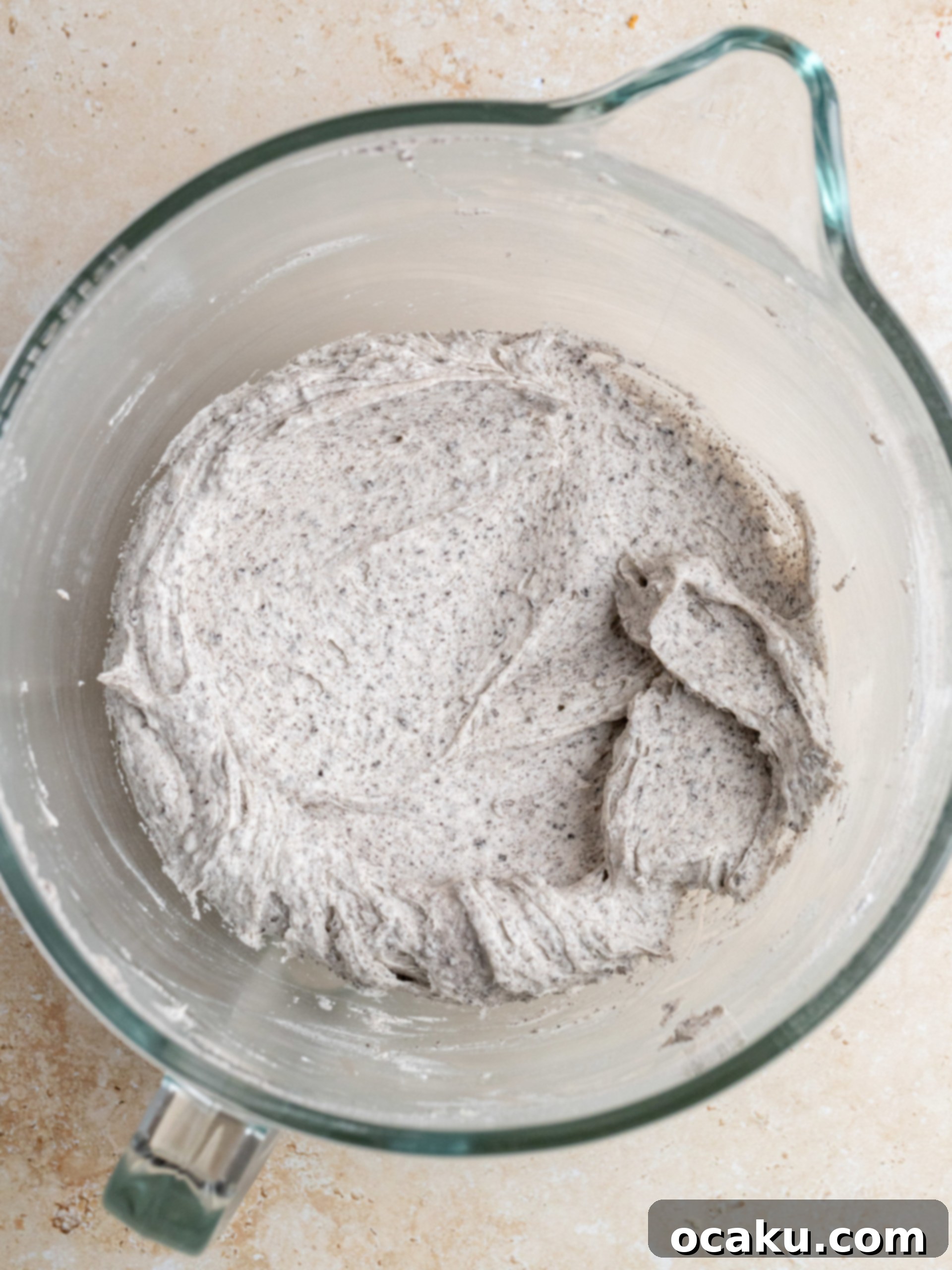 A bowl of creamy, white Oreo buttercream, perfectly smooth and ready for piping.