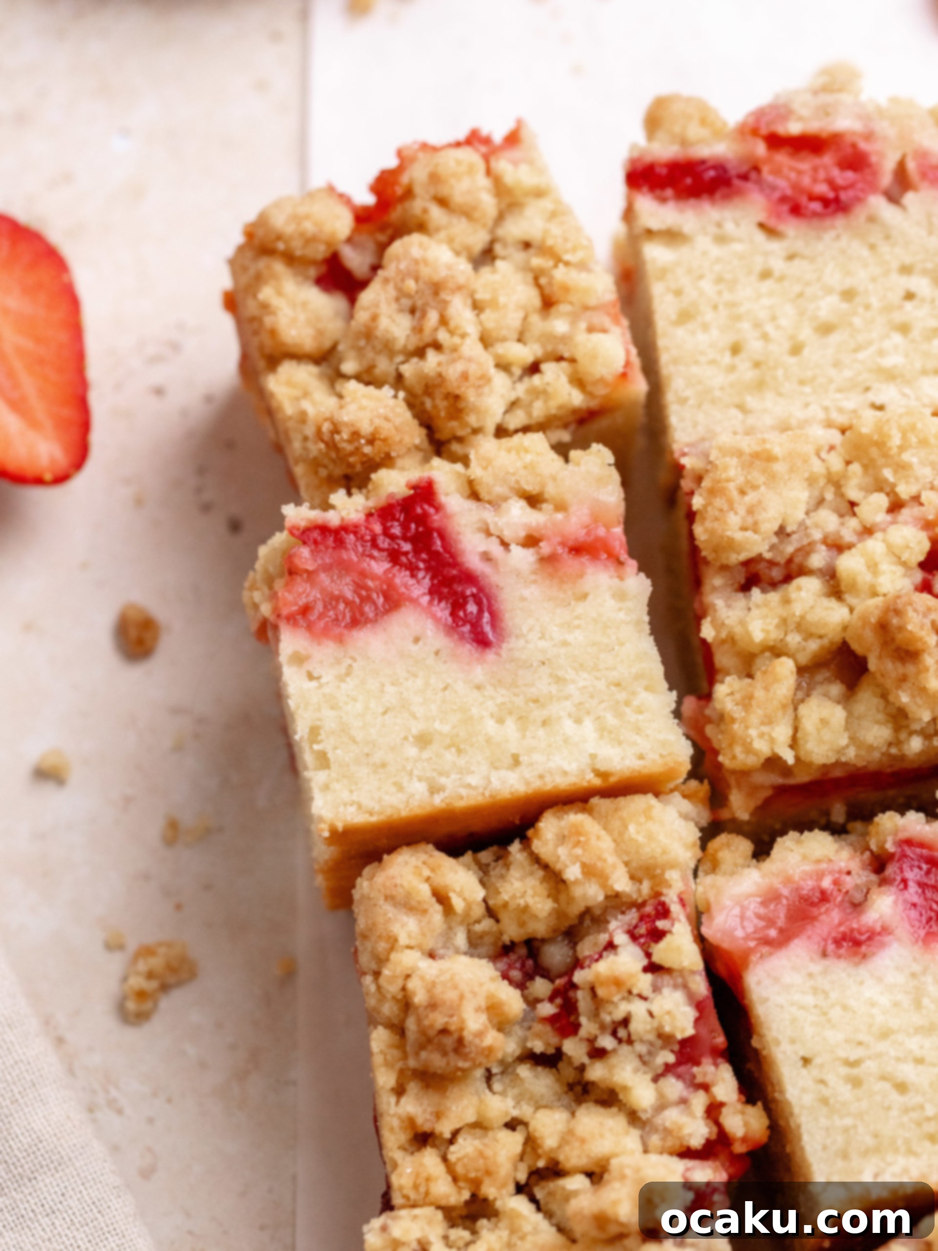 Strawberry Streusel Cake 8 A beautiful whole strawberry crumble cake cooling on a wire rack.