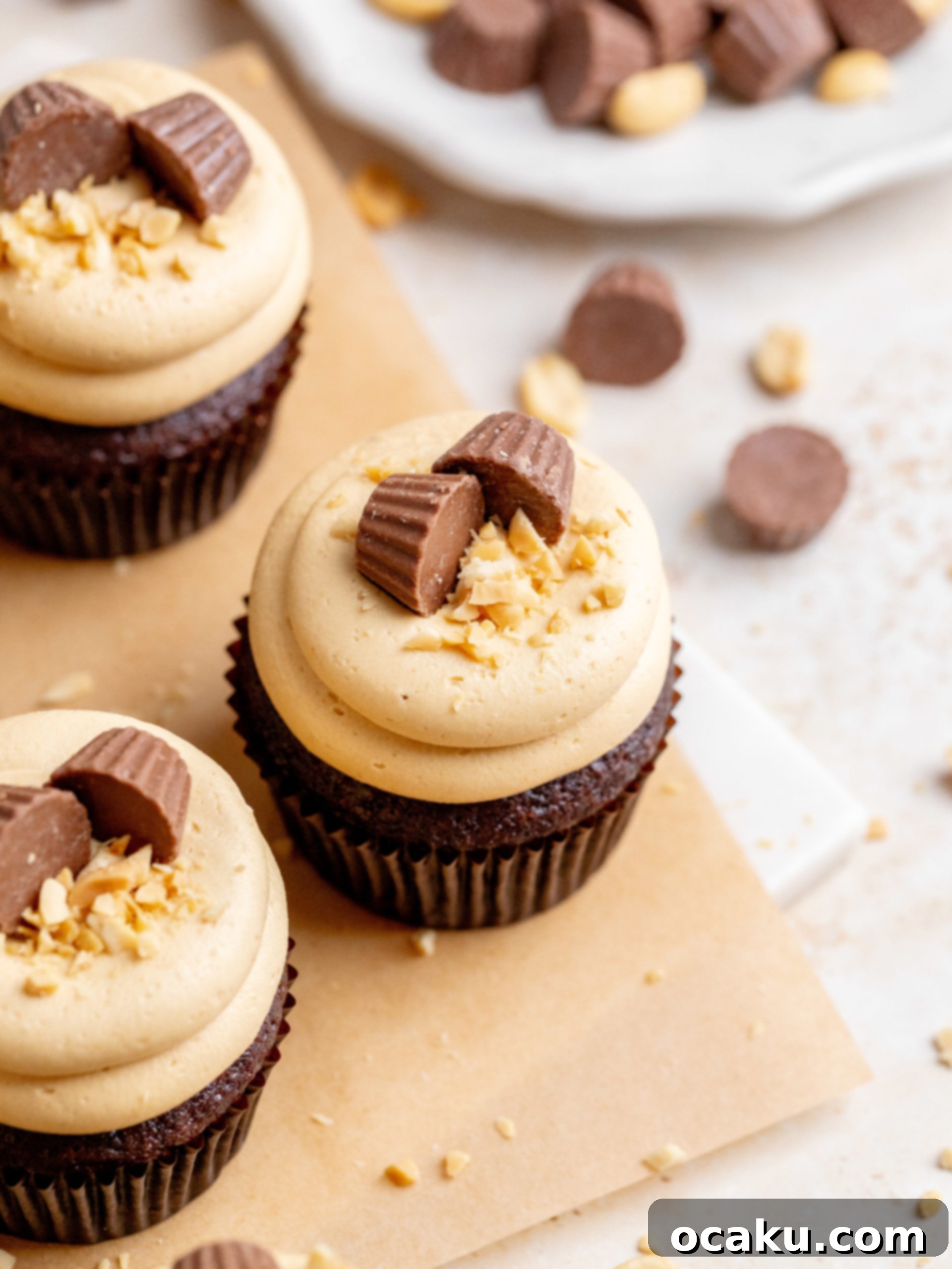 Close-up of a Peanut Butter Chocolate Cupcake revealing the creamy peanut butter filling inside the moist chocolate cake.