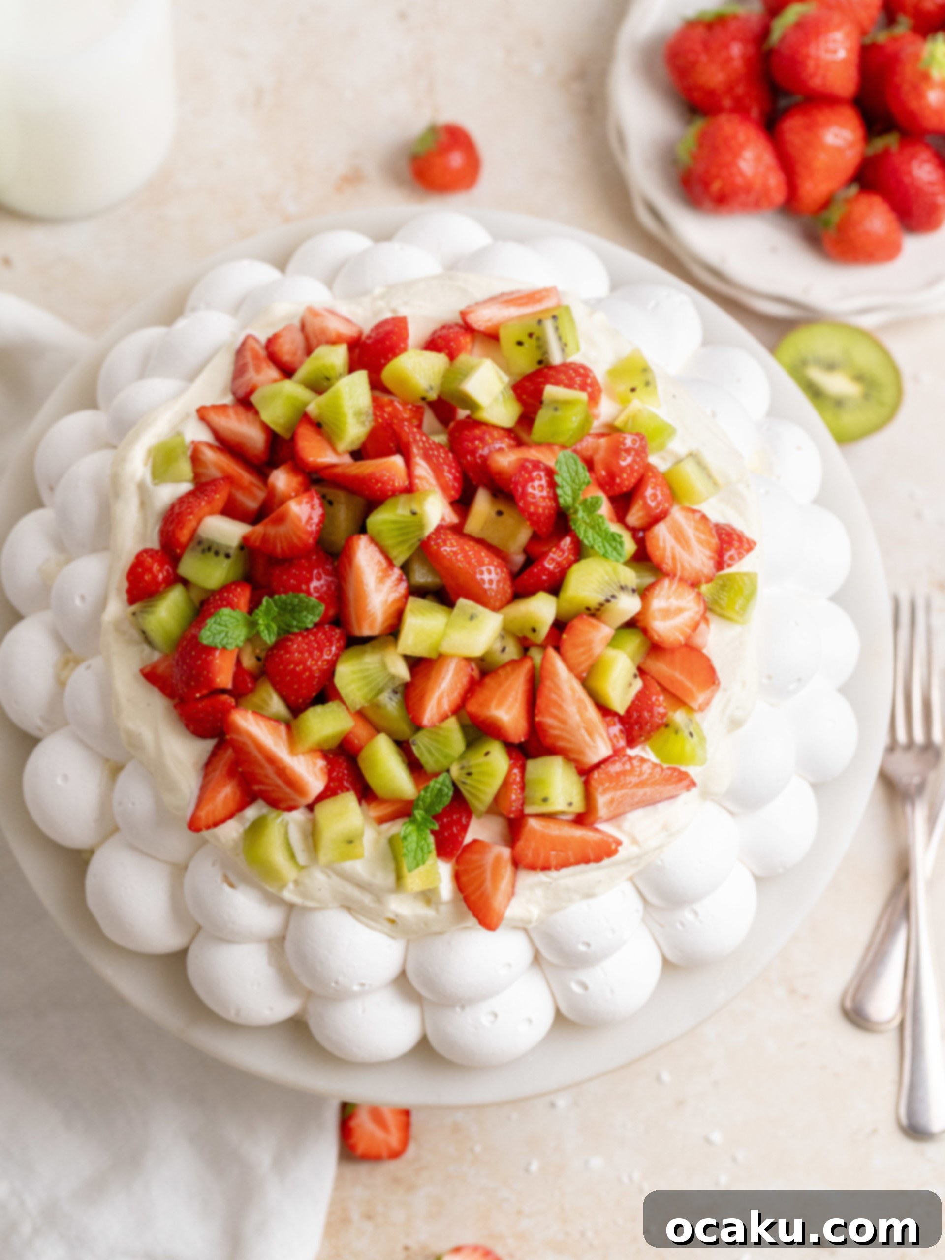 Beautifully baked Summer Pavlova with golden edges and a fluffy interior, ready for toppings