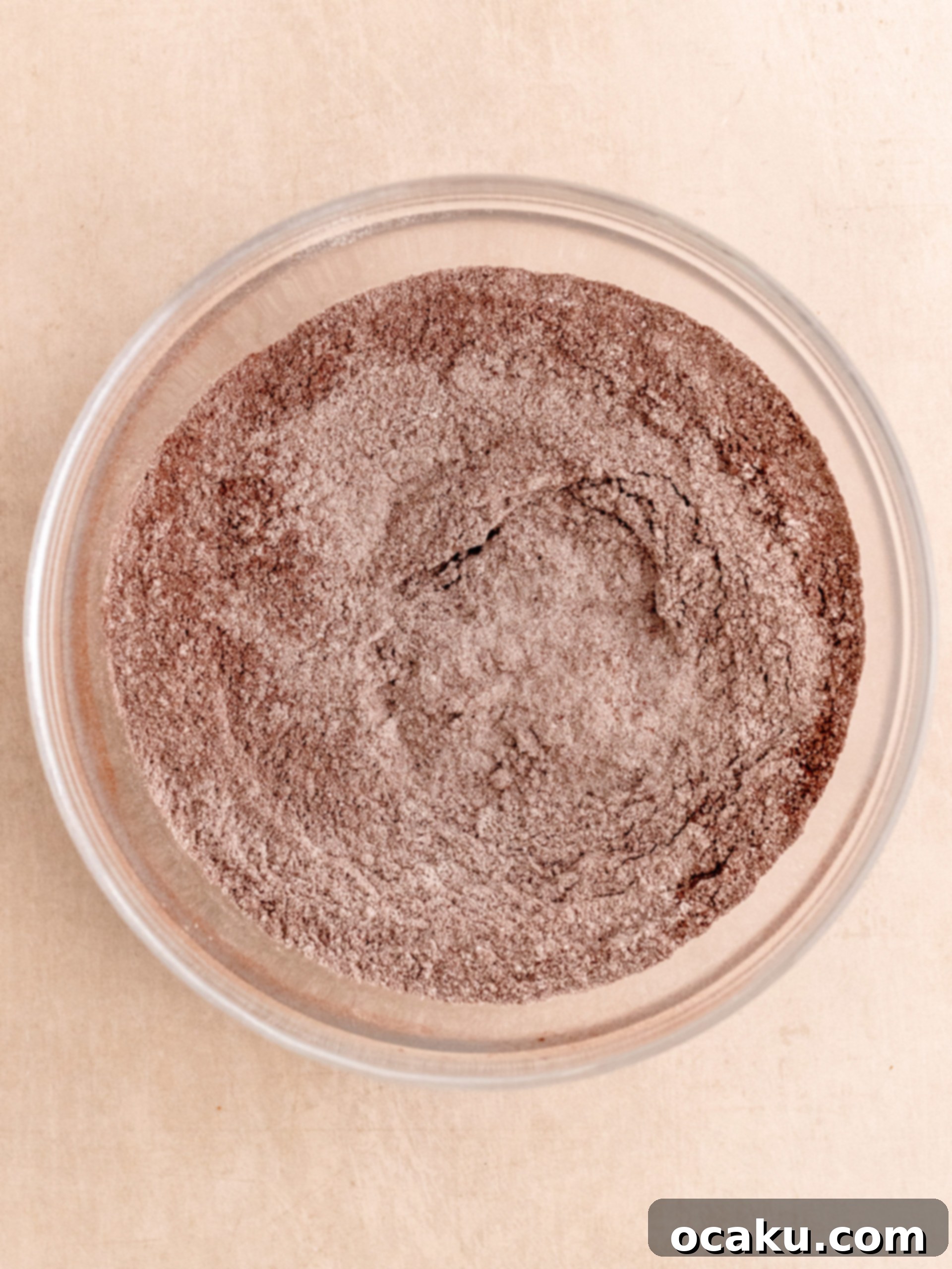 Mixing dry ingredients for chocolate cupcakes