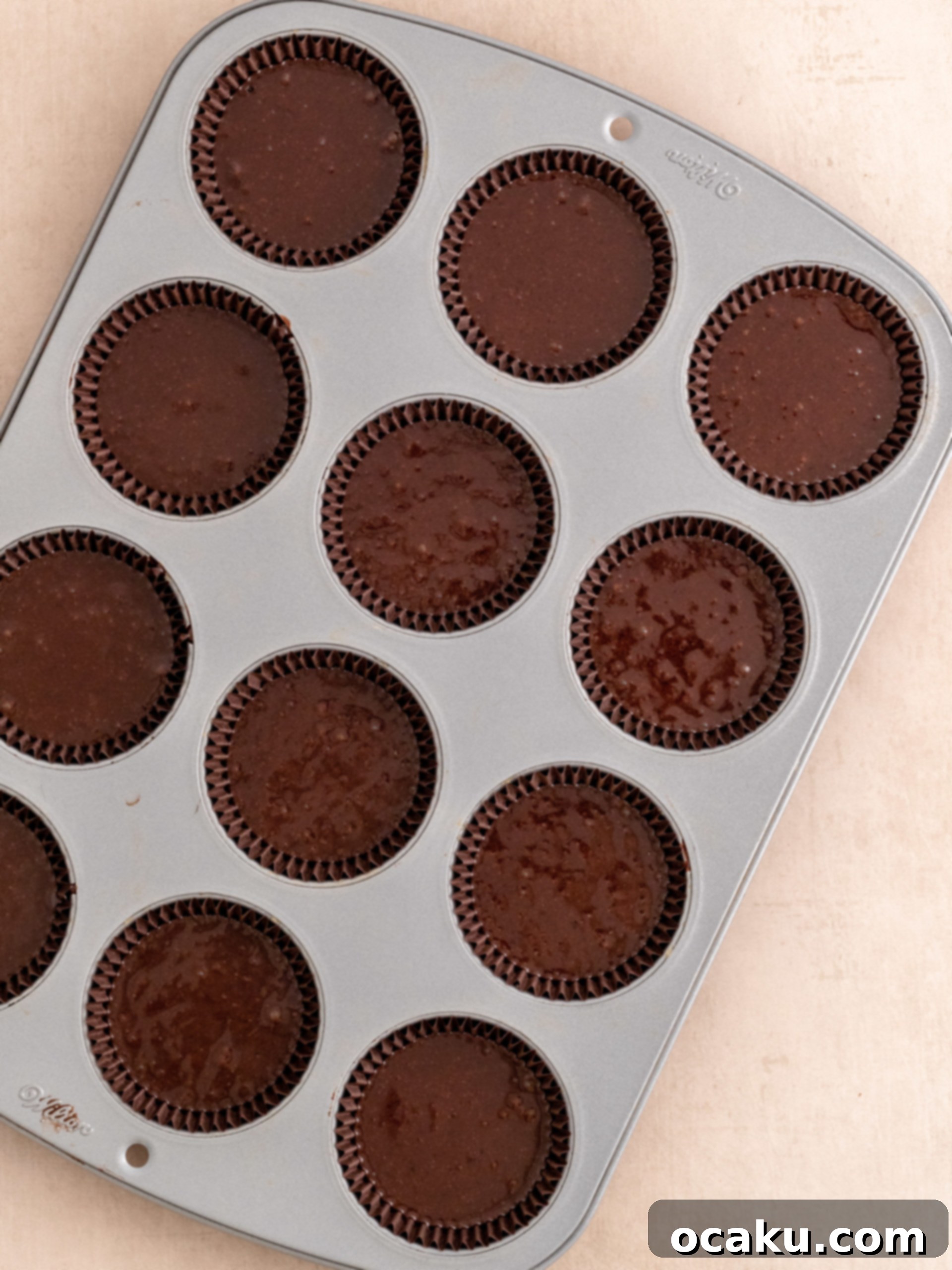 Cupcake batter in liners, ready for baking