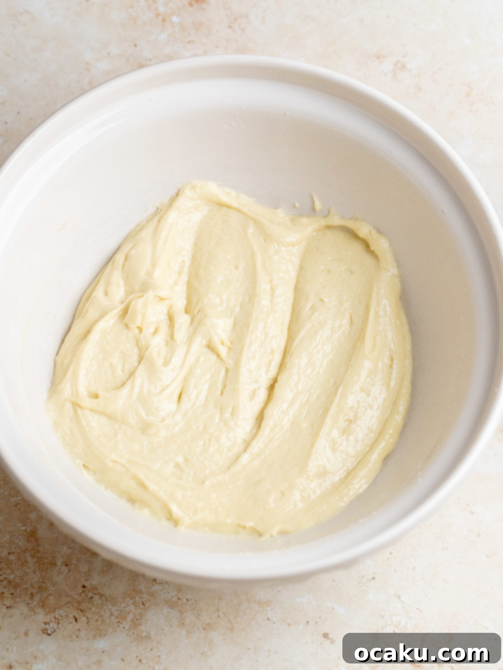 Mixing butter and sugar for cake batter