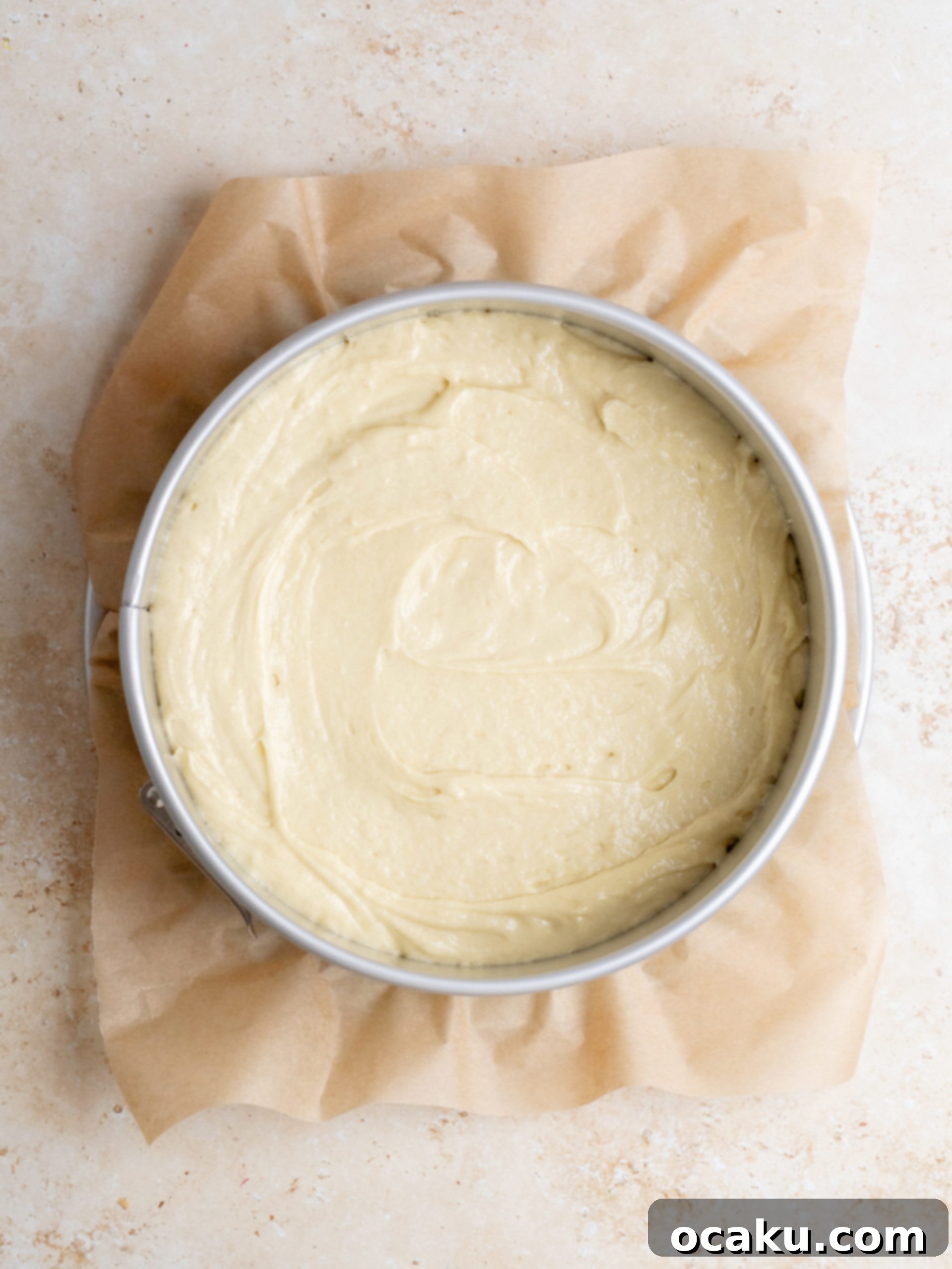 Adding eggs to cake batter