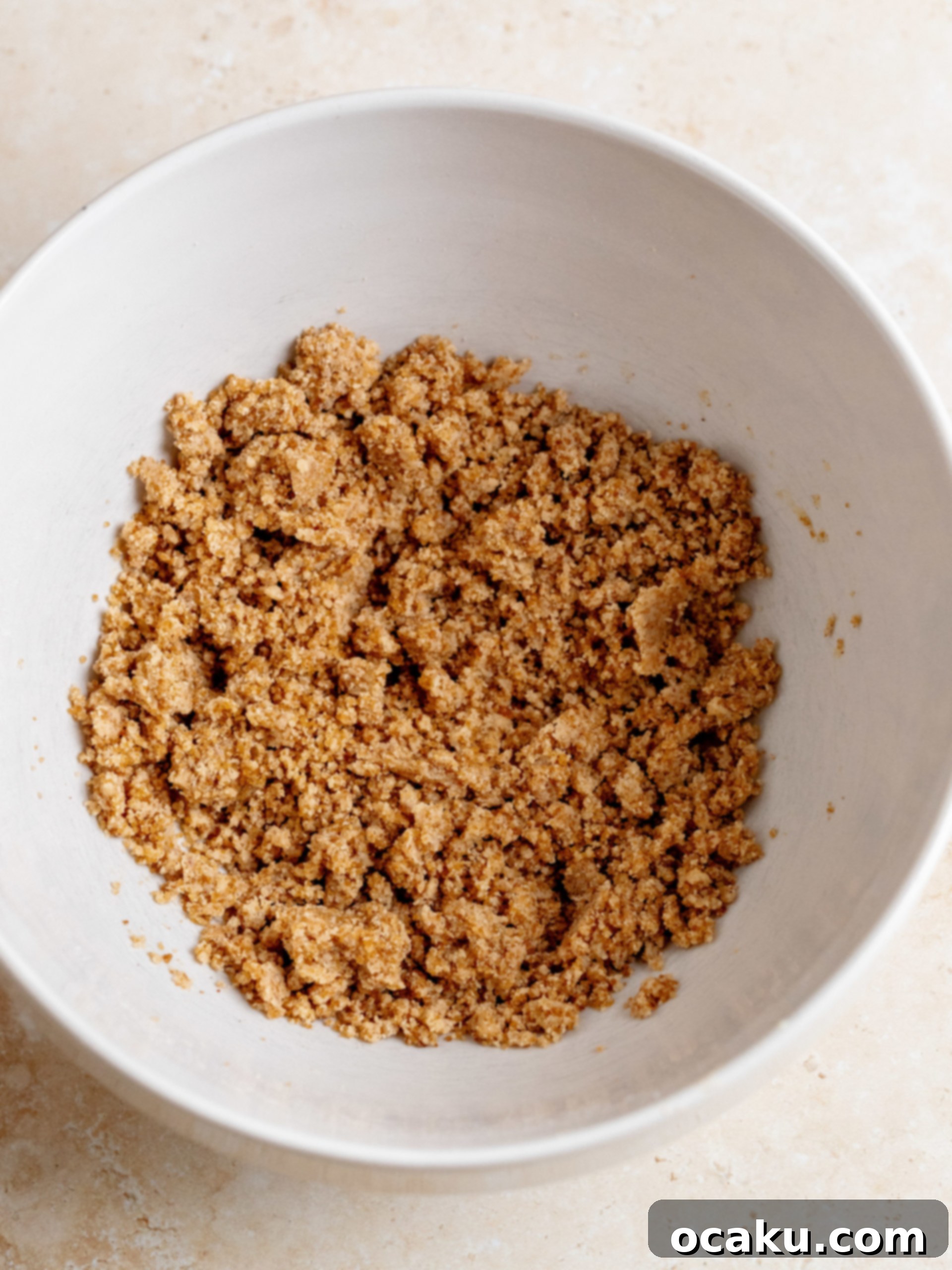 Baked Cinnamon Loaf Cake on a cooling rack before glazing