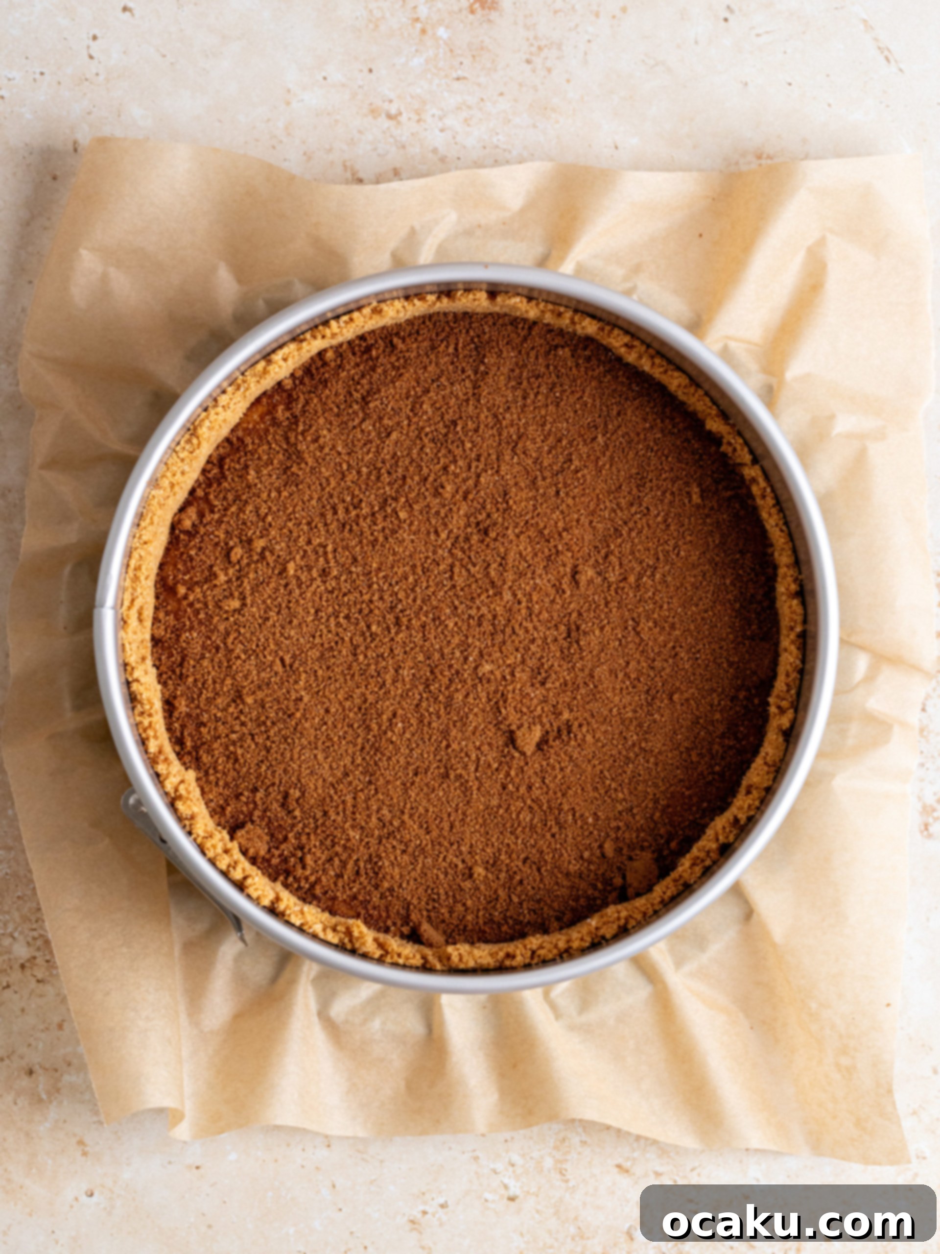 Mixing the crumble ingredients with melted butter using a fork