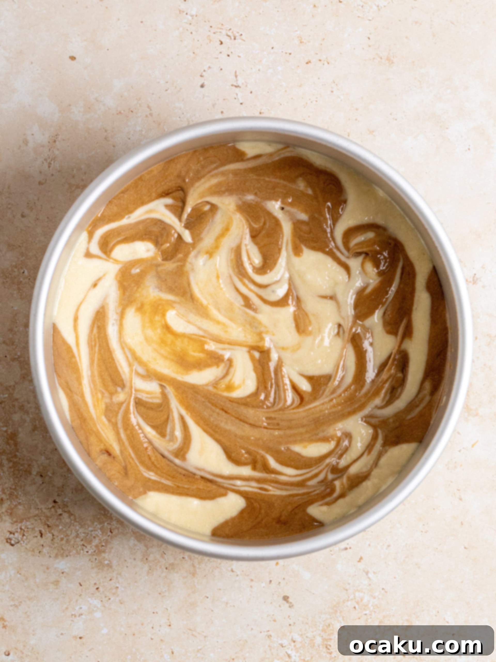 Espresso-Soaked Tiramisu Masterpiece 6 Mixing instant espresso powder into half of the cake batter.