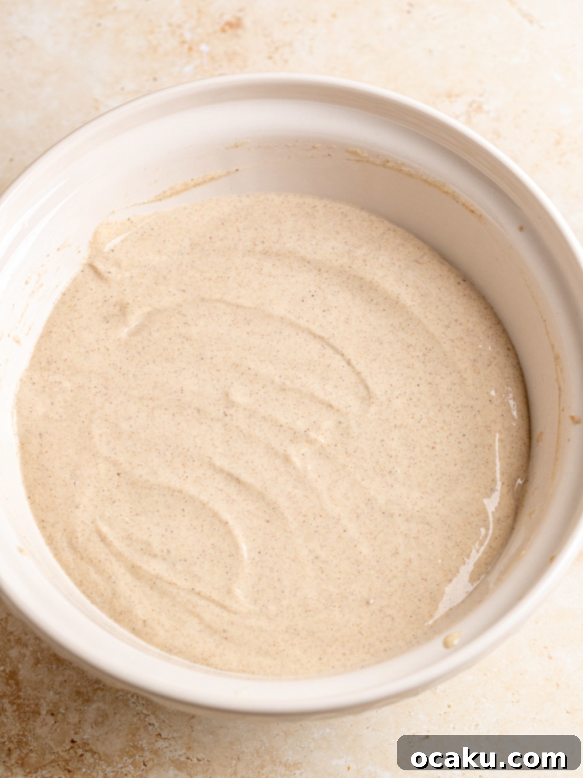 Cheesecake baking in a water bath.