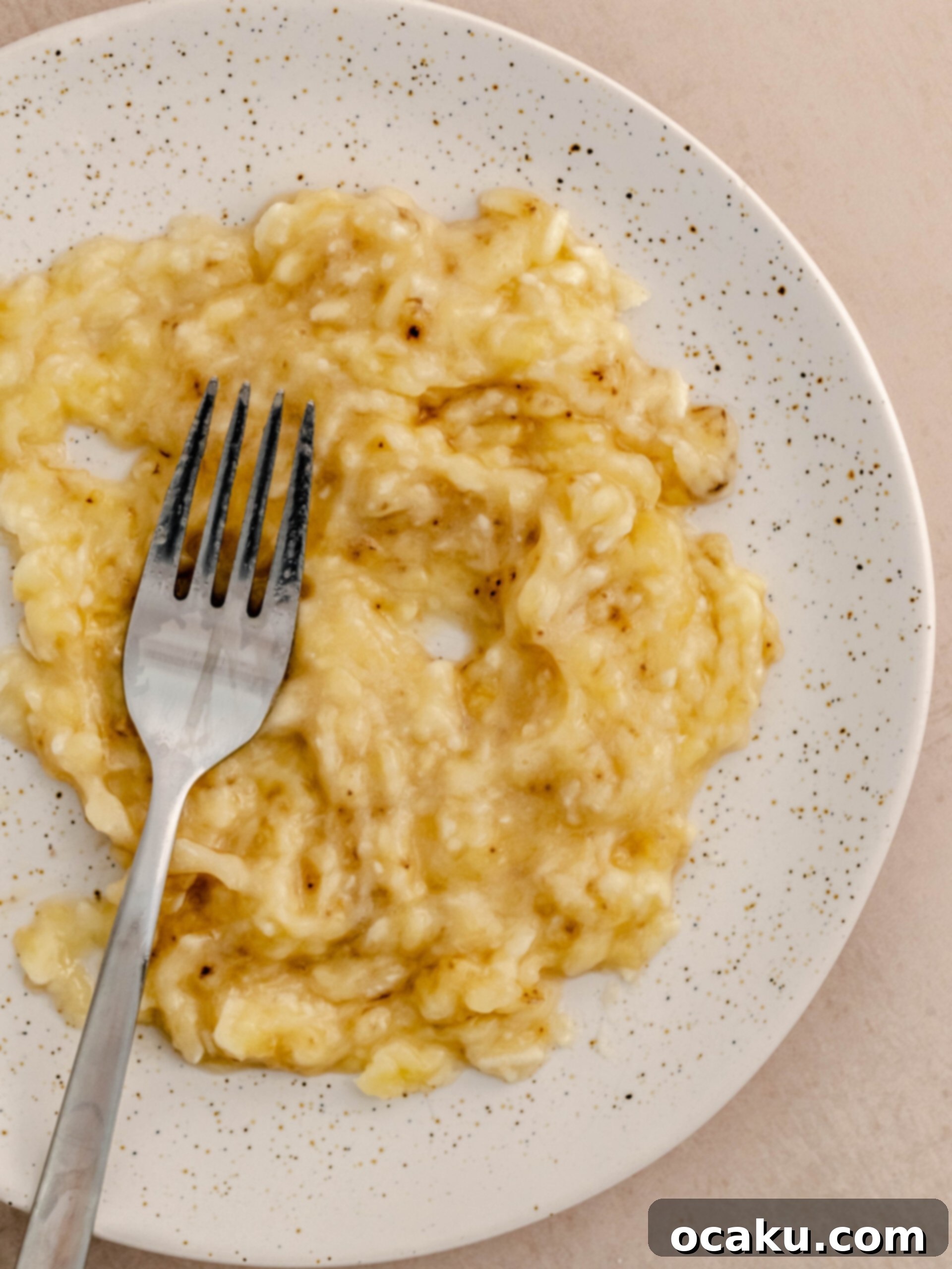 Mashing ripe bananas in a bowl