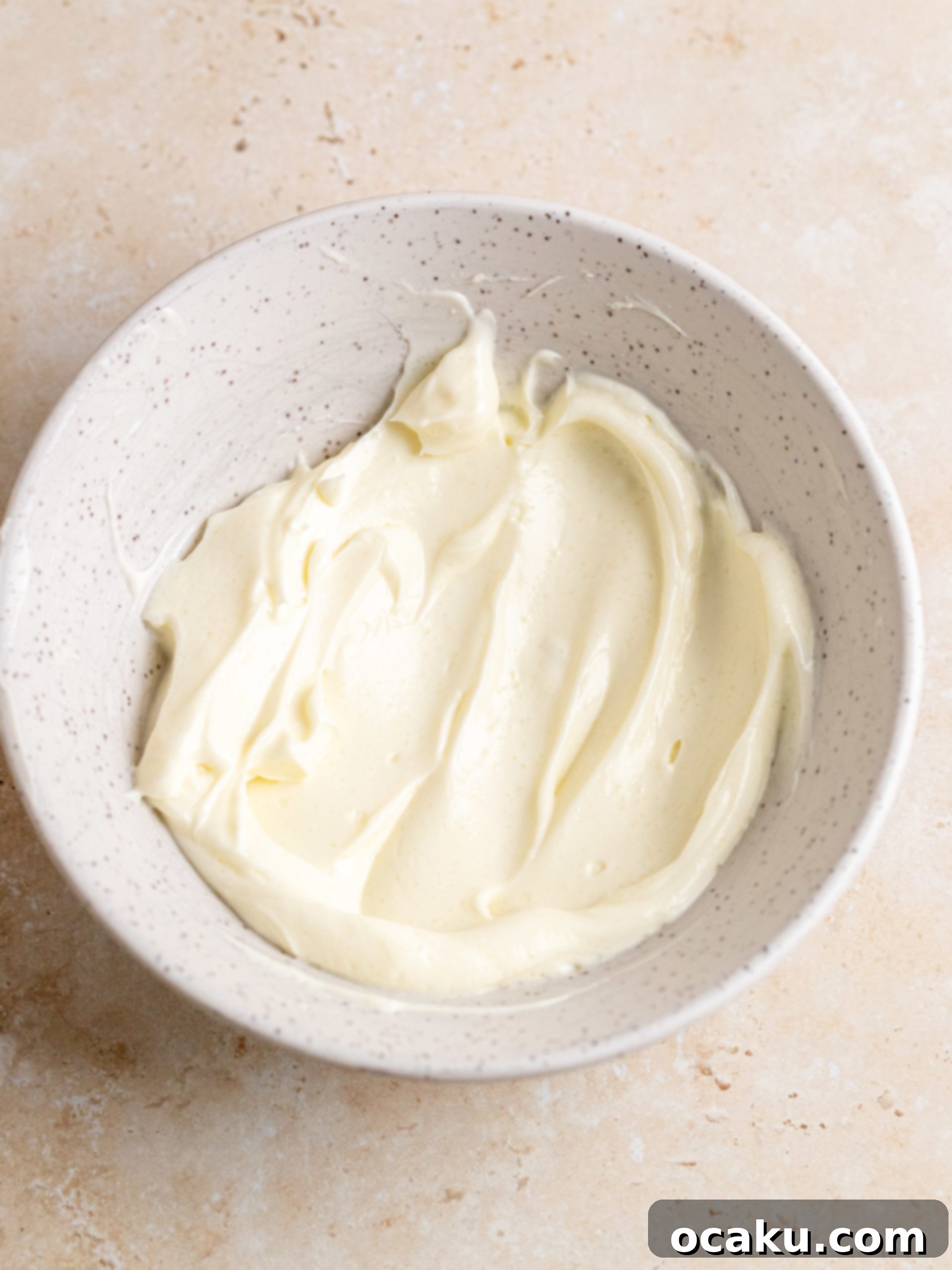 Muffin tin prepared with alternating liners for better dome.