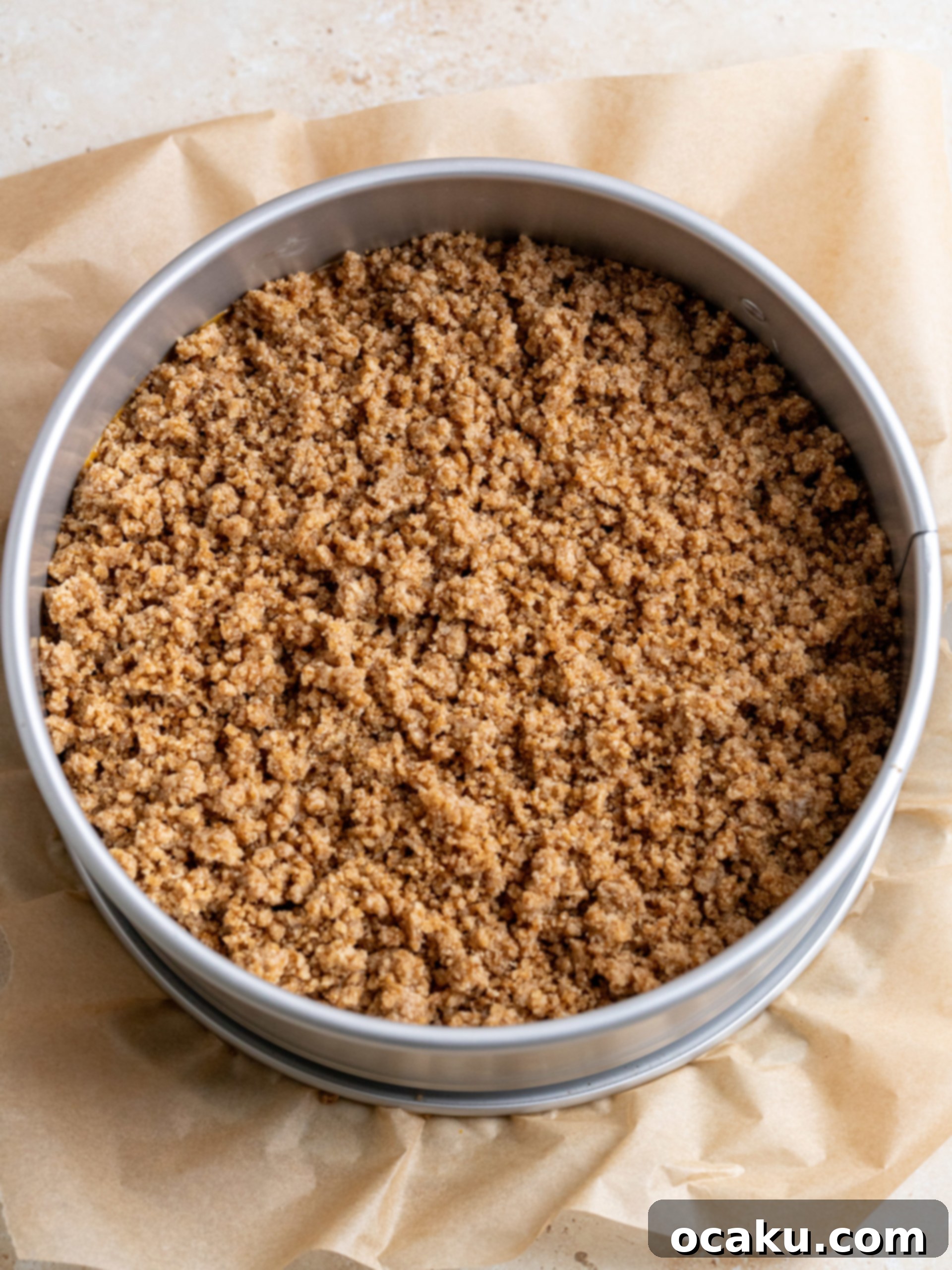 Drizzling glaze over the cooled Pumpkin Coffee Cake.