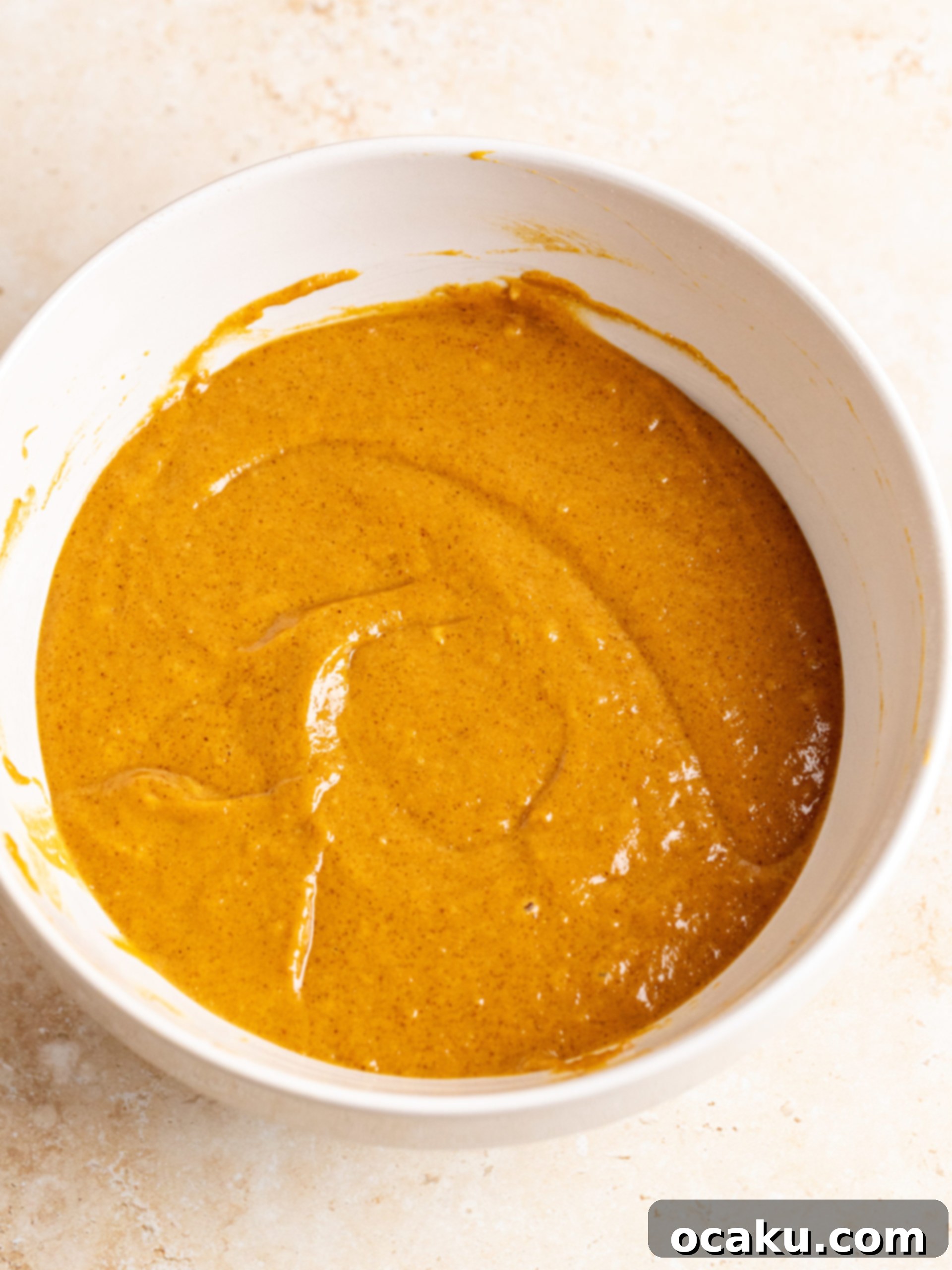 Butter and brown sugar creaming in a stand mixer.