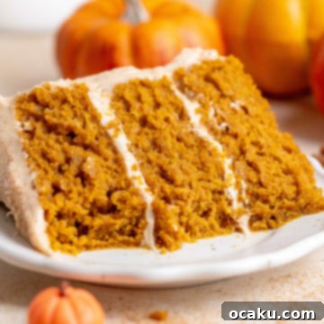 Pumpkin Layer Cake with Cinnamon Cream Cheese Frosting slice