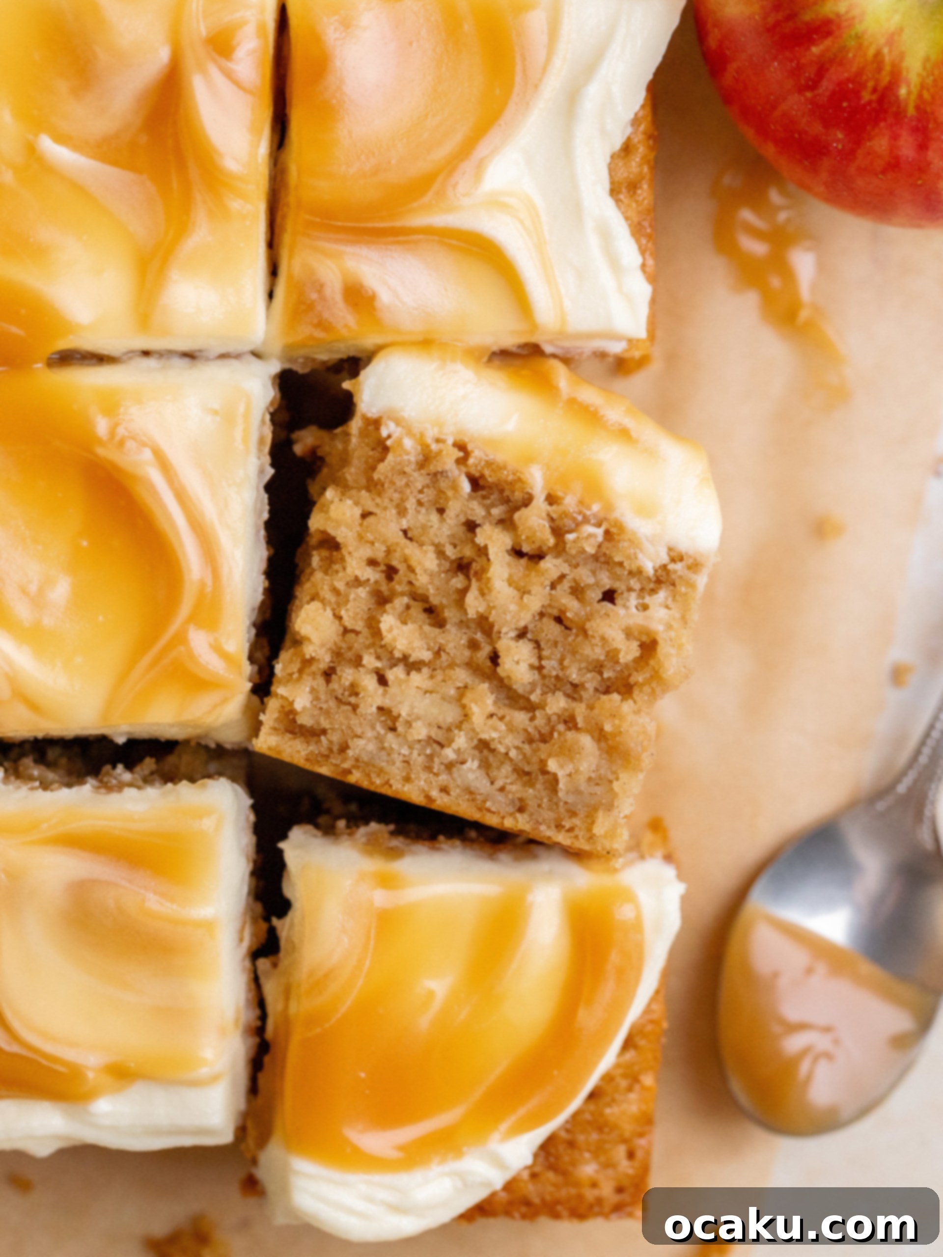 A beautifully frosted Caramel Apple Cake with a rich caramel drizzle, perfect for autumn celebrations.