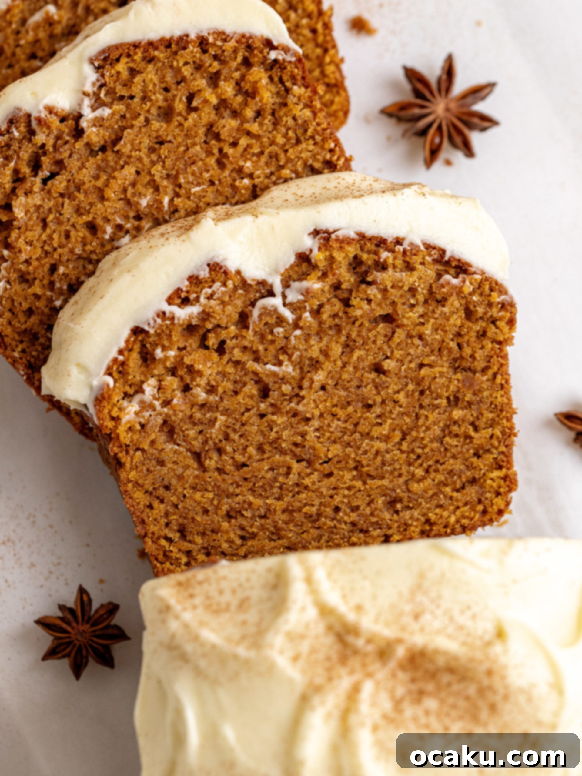 A close-up of a slice of sweet potato bread showing the moist texture and hints of spice.