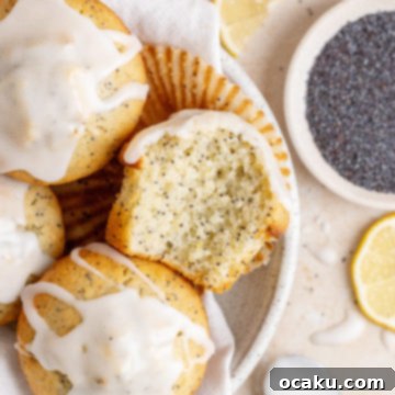 Perfectly baked and glazed Lemon Poppy Seed Muffins.