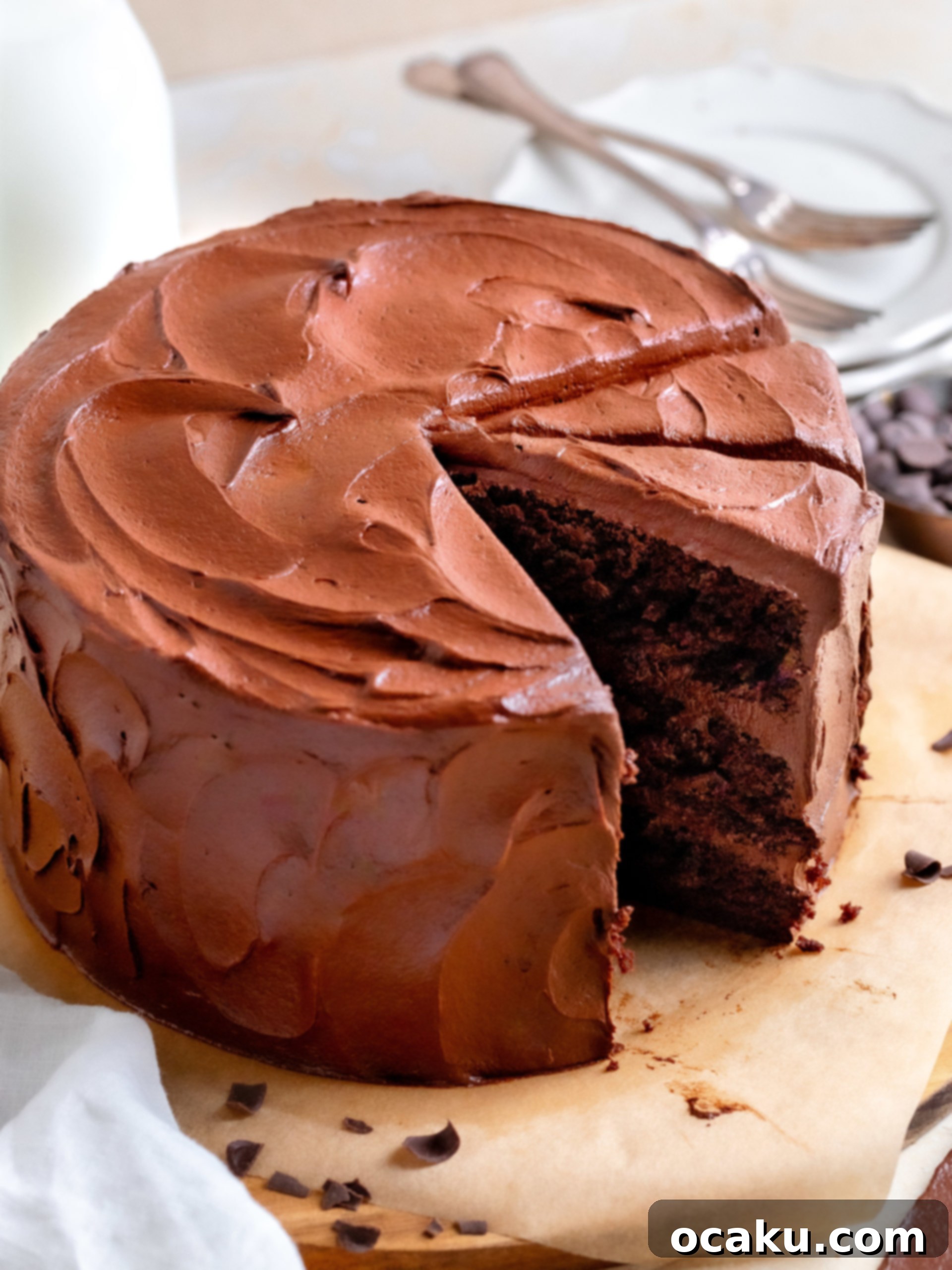 Matilda's Irresistibly Moist Cake 3 Close-up of a perfectly baked, light and fluffy chocolate cake layer, cooling on a wire rack.