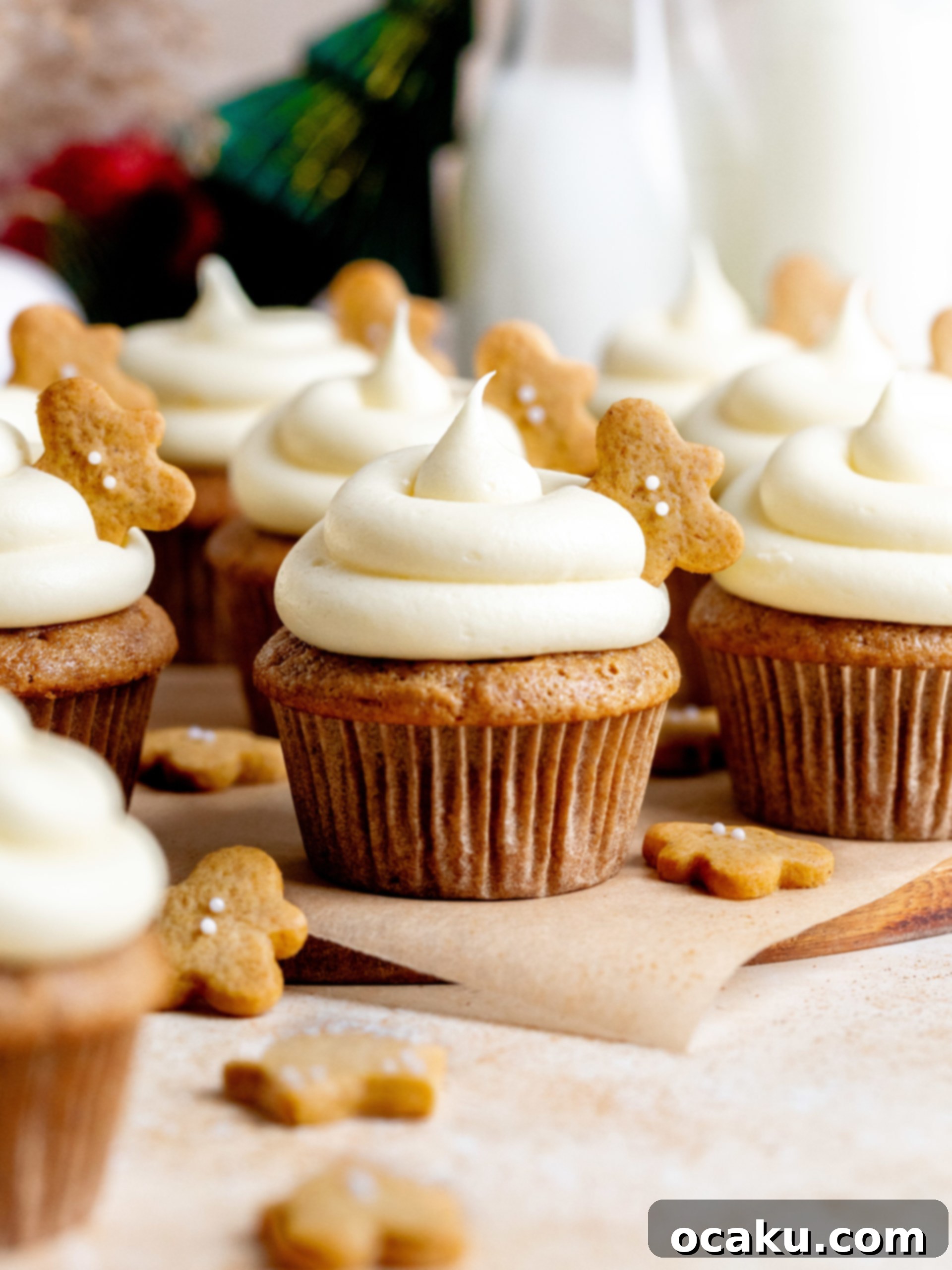 Various gingerbread cookie shapes decorated with white icing.