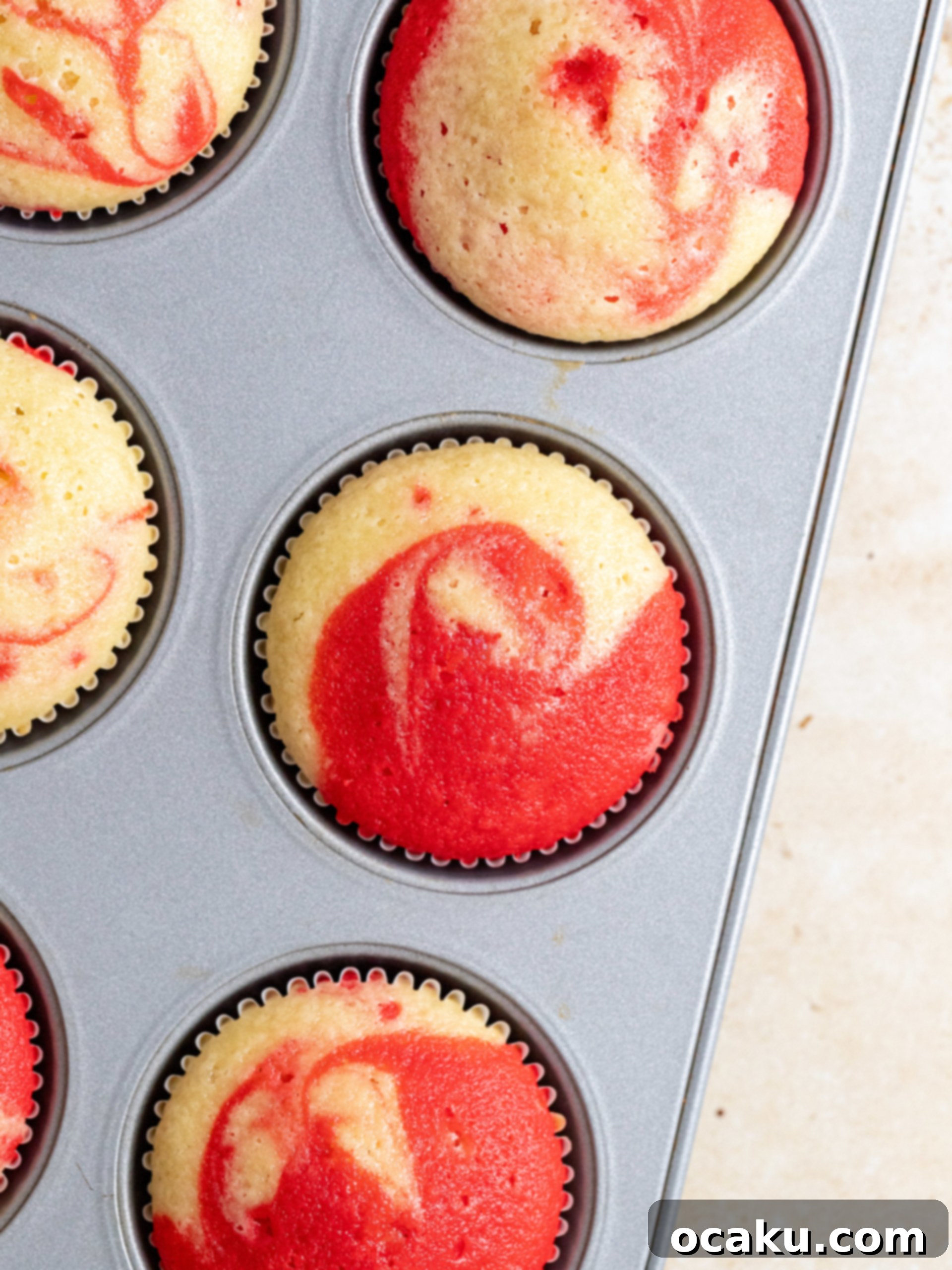 Close-up of a decorated white chocolate peppermint cupcake.
