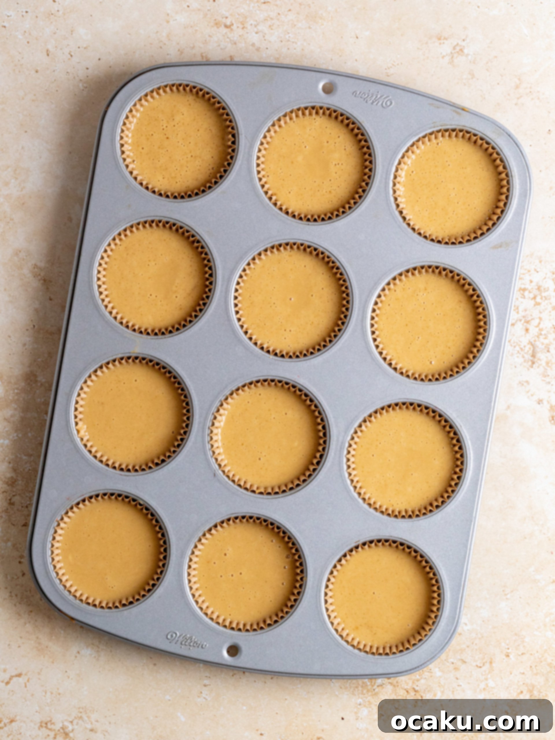 Step-by-step image showing buttercream piped onto a cupcake with a concave center.