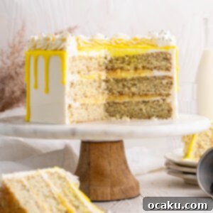 Lemon Poppy Seed Layer Cake, an incredibly fresh and tangy spring dessert with lemon curd and white chocolate buttercream.