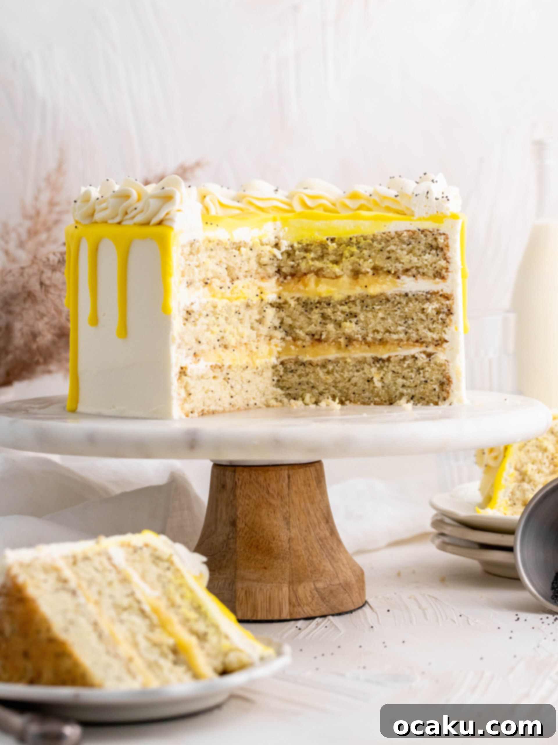 Close-up of baked lemon poppy seed cake layers, showcasing their tender crumb and even baking.