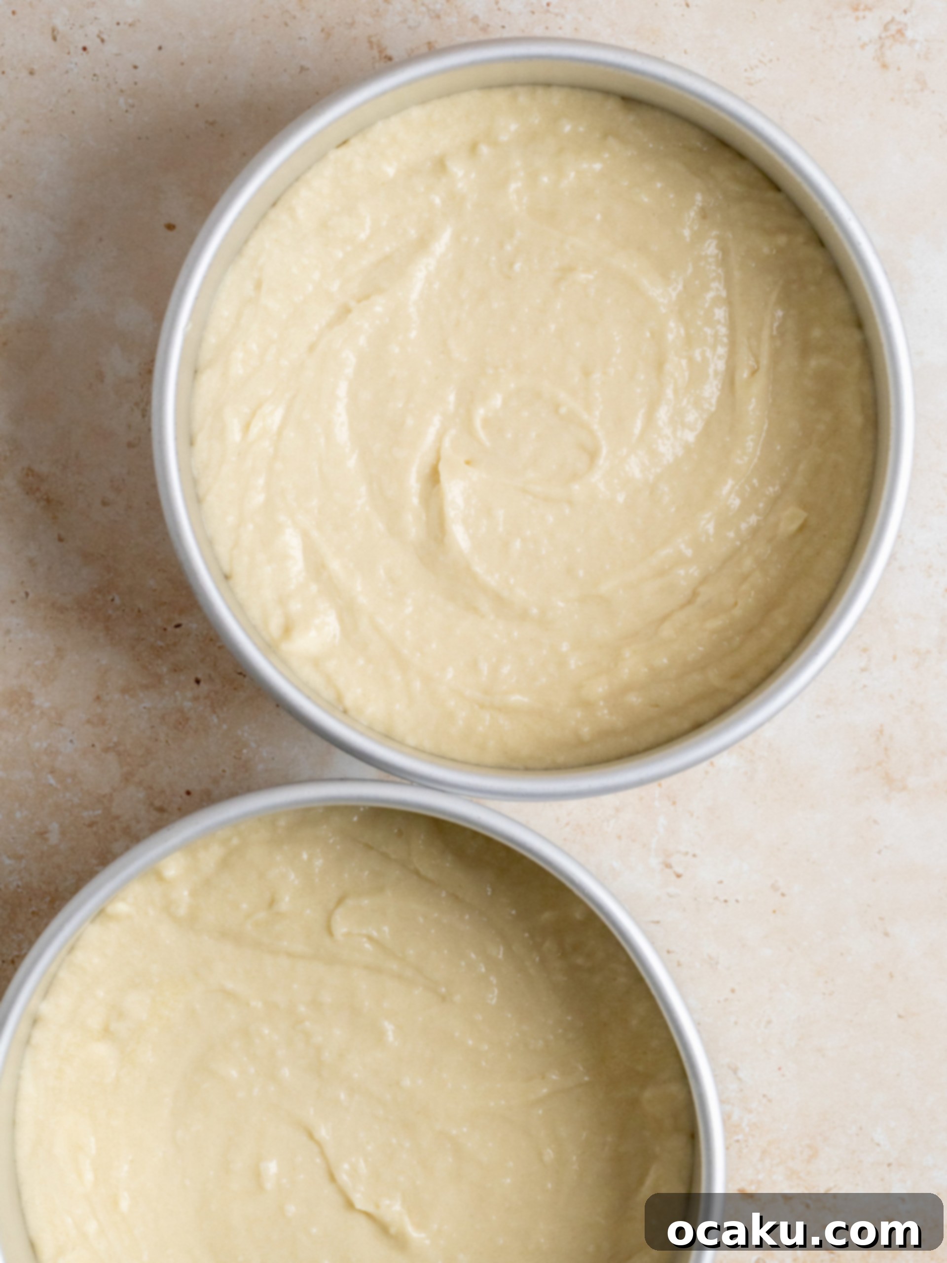 Ultimate Coconut Cloud Cake 5 Mixing coconut cake batter in a stand mixer