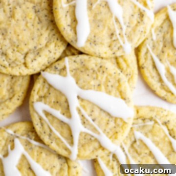 A stack of lemon poppy seed cookies with glaze