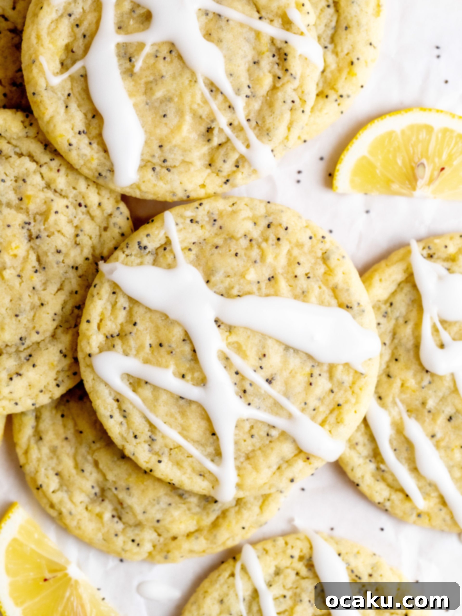 A plate of fresh lemon poppy seed cookies, showing their soft centers.