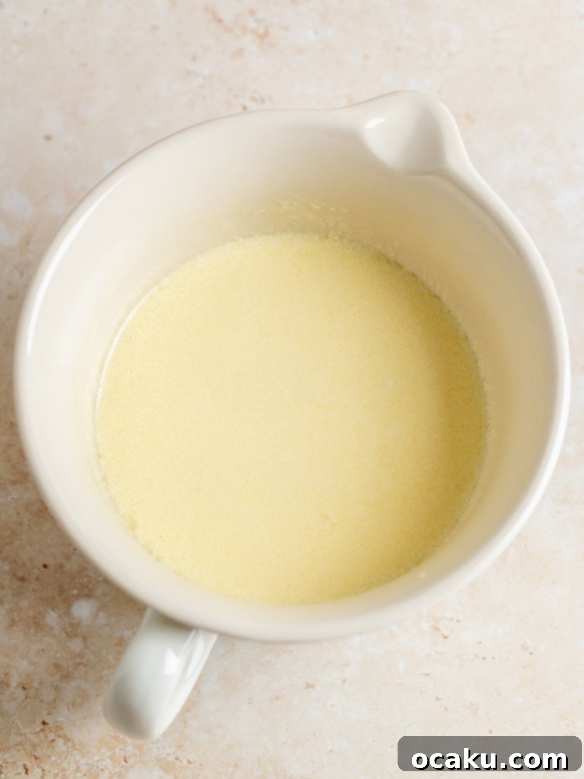 Mixing wet ingredients for carrot cake