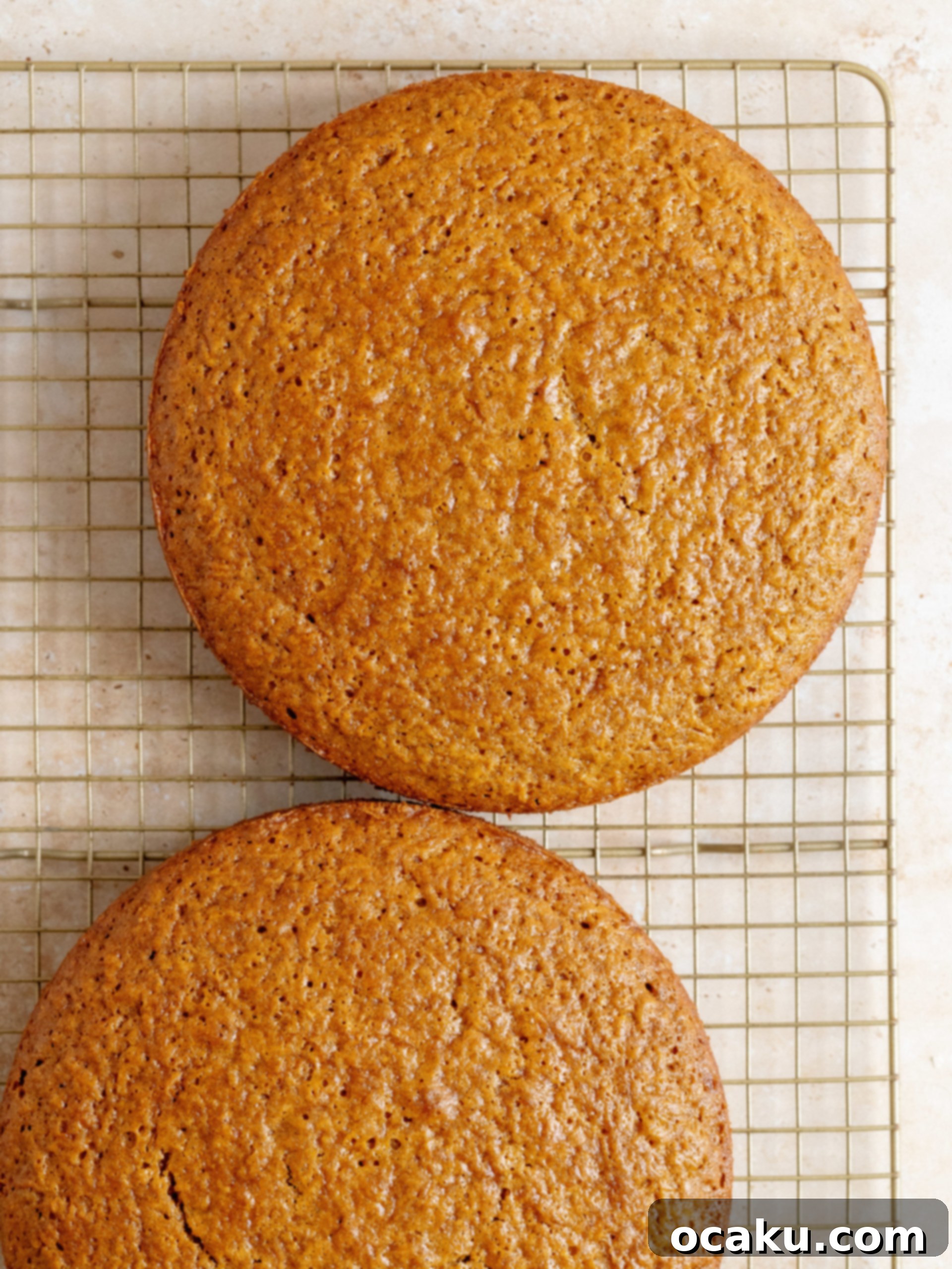 Spreading frosting evenly with offset spatula