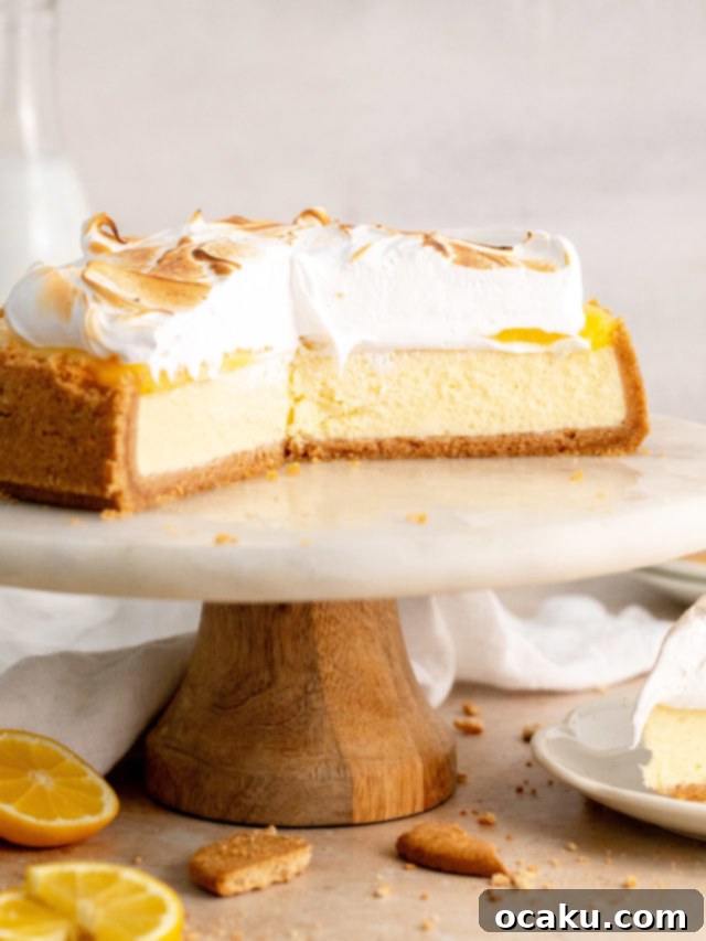 A show-stopping lemon meringue cheesecake with toasted meringue peaks and a creamy lemon filling
