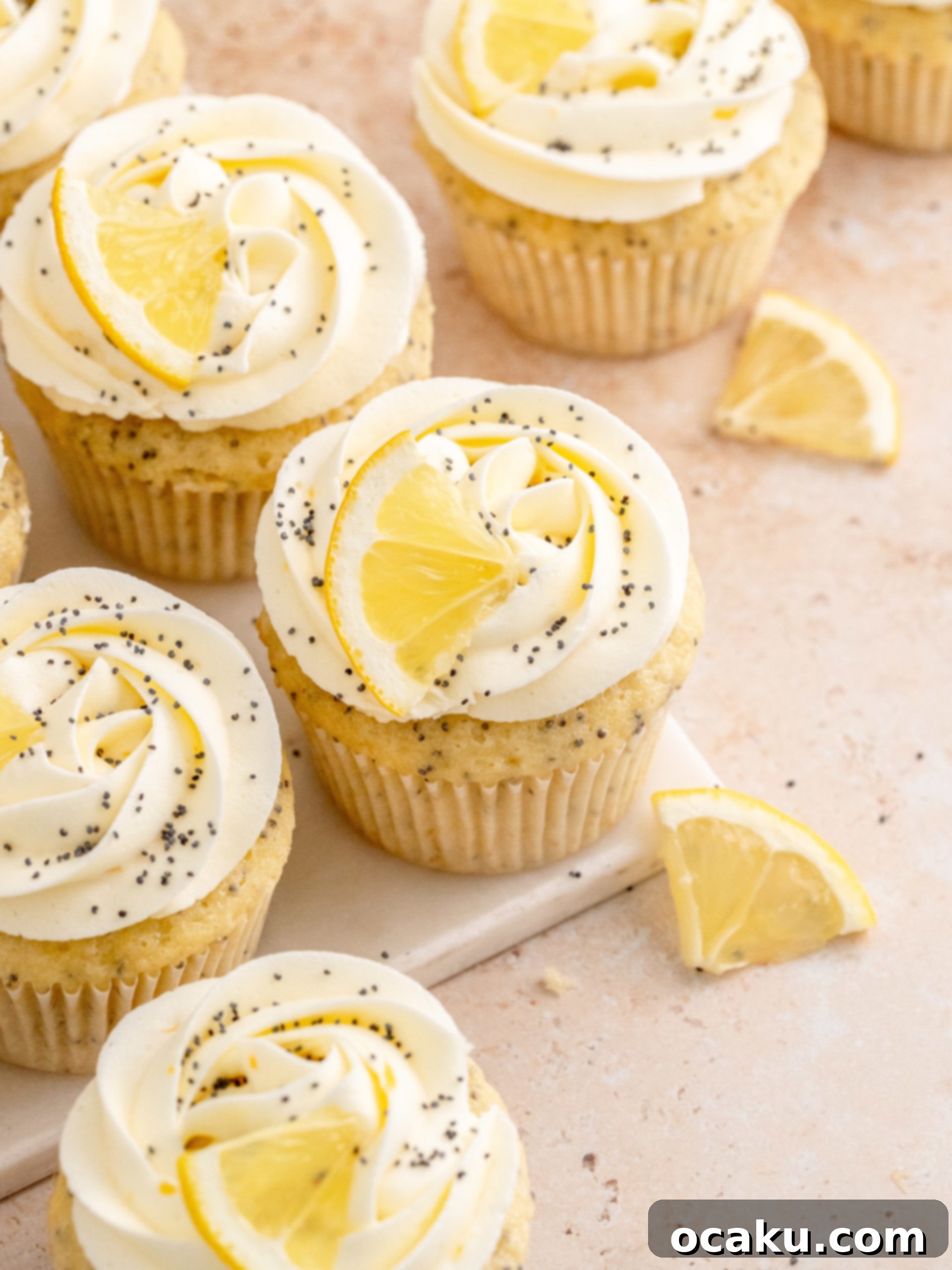 Soft lemon poppy seed cupcakes with a generous swirl of smooth lemon buttercream